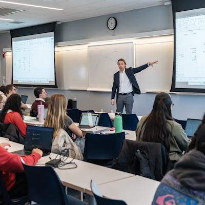 Professor Bonini teaching in a classroom