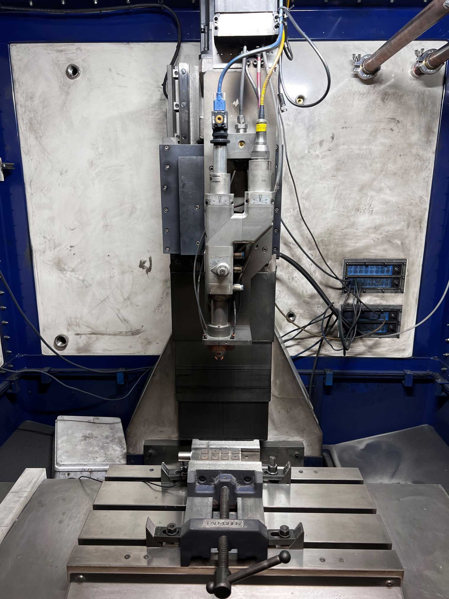 Experimental setup for multimodal monitoring of Laser Directed Energy Deposition (LDED) processes for geometric variation detection.