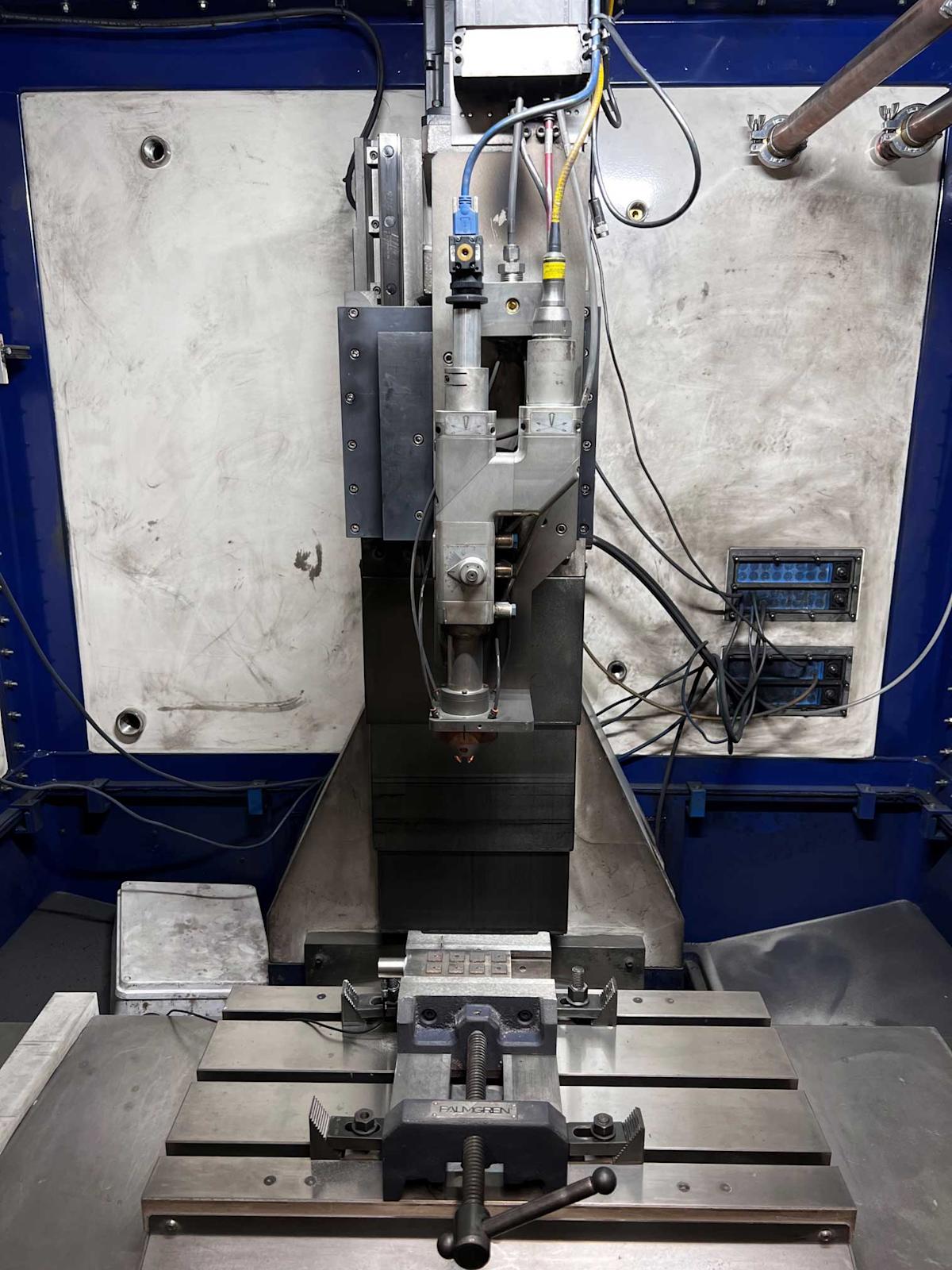 Experimental setup for multimodal monitoring of Laser Directed Energy Deposition (LDED) processes for geometric variation detection.