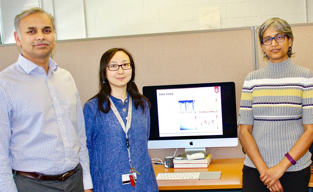 Stevens professor Rajarathnam Chandramouli, Ph.D. student Zongru (Doris) Shao and professor K.P. Subbalakshmi in a lab