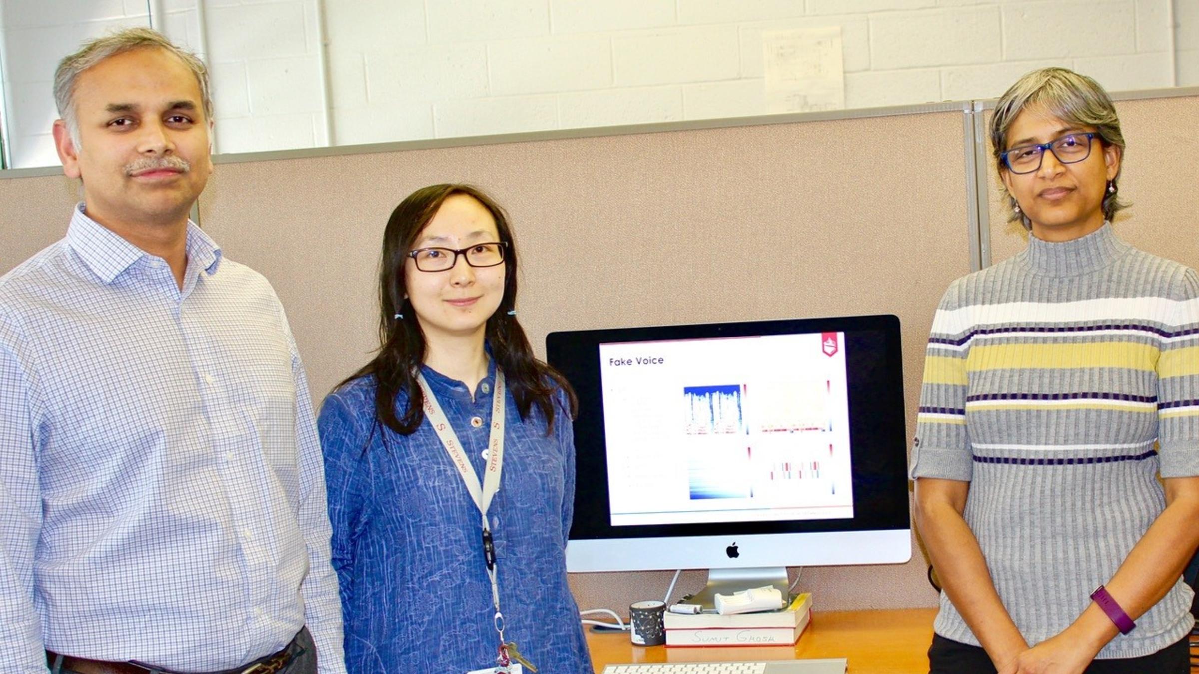 Stevens professor Rajarathnam Chandramouli, Ph.D. student Zongru (Doris) Shao and professor K.P. Subbalakshmi in a lab