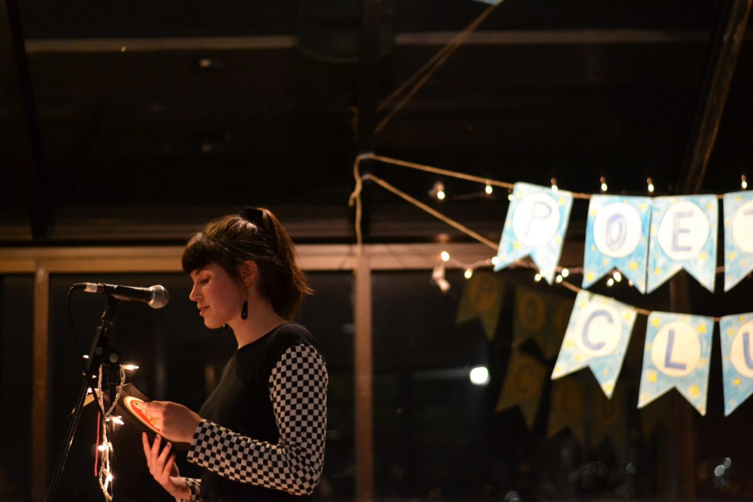 Visual arts and Technology senior Kelly McGowan at a poetry event