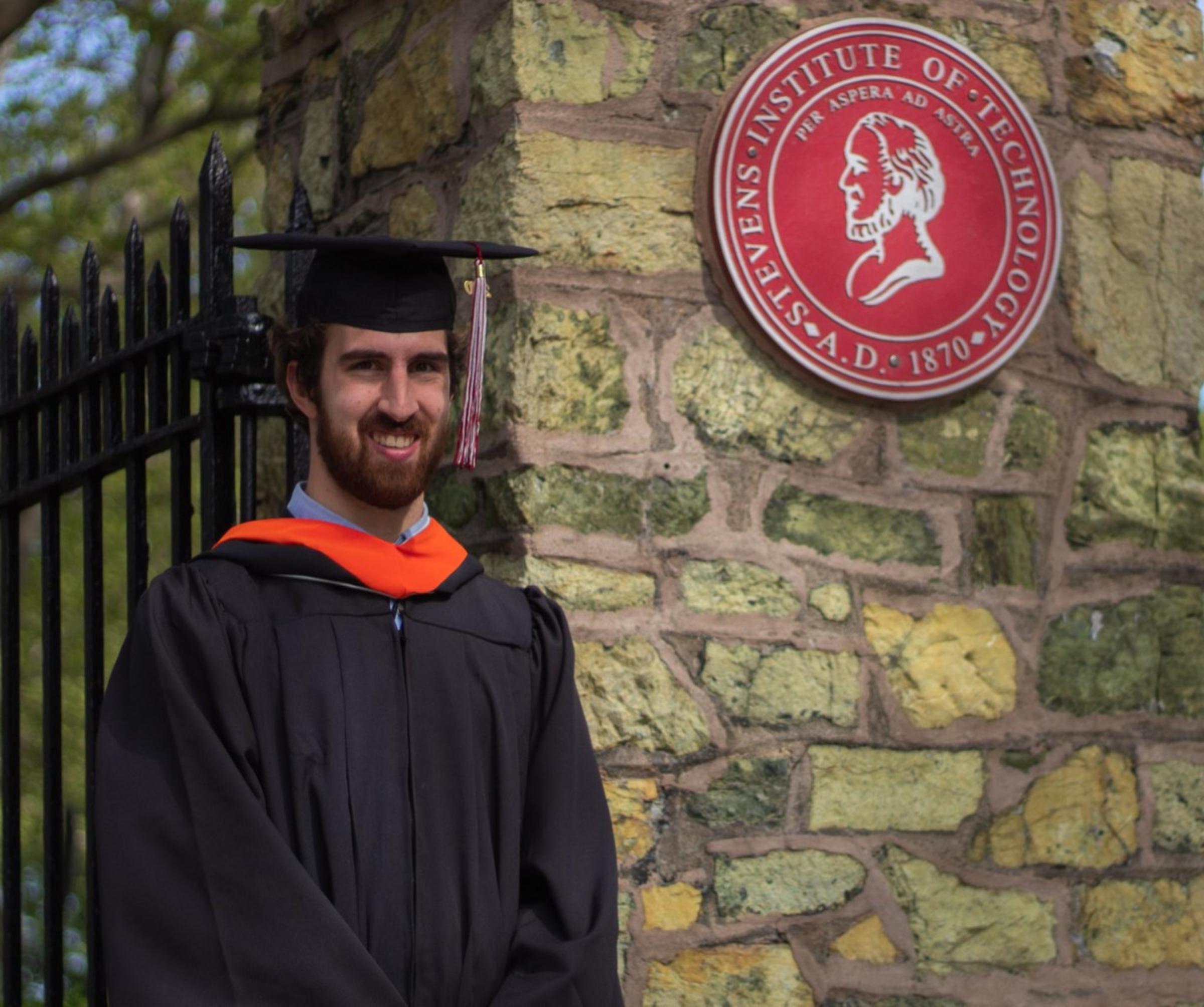 Dan Rosenberger in graduation cap and gown
