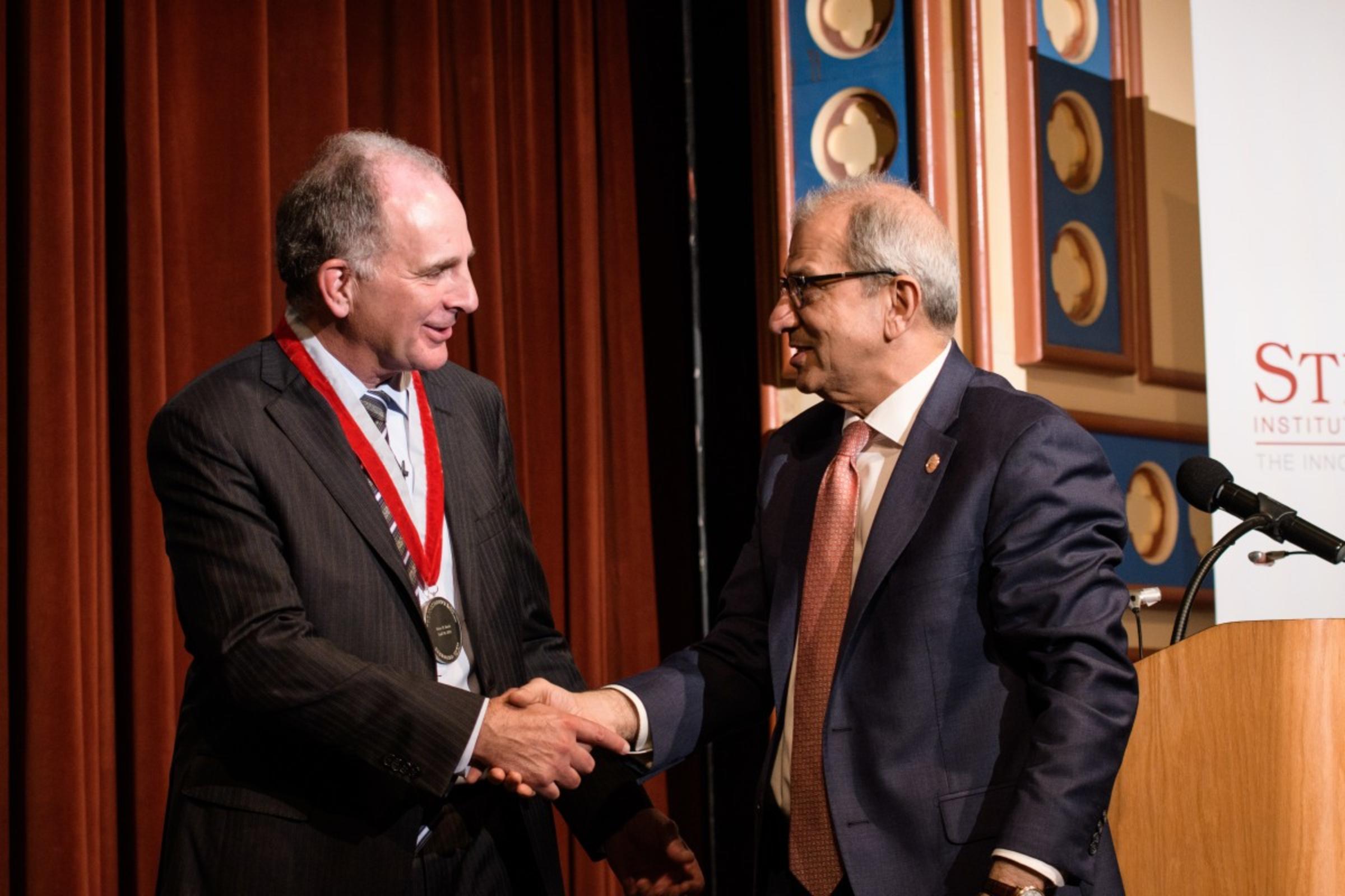 Bruce March receives the President's Medal