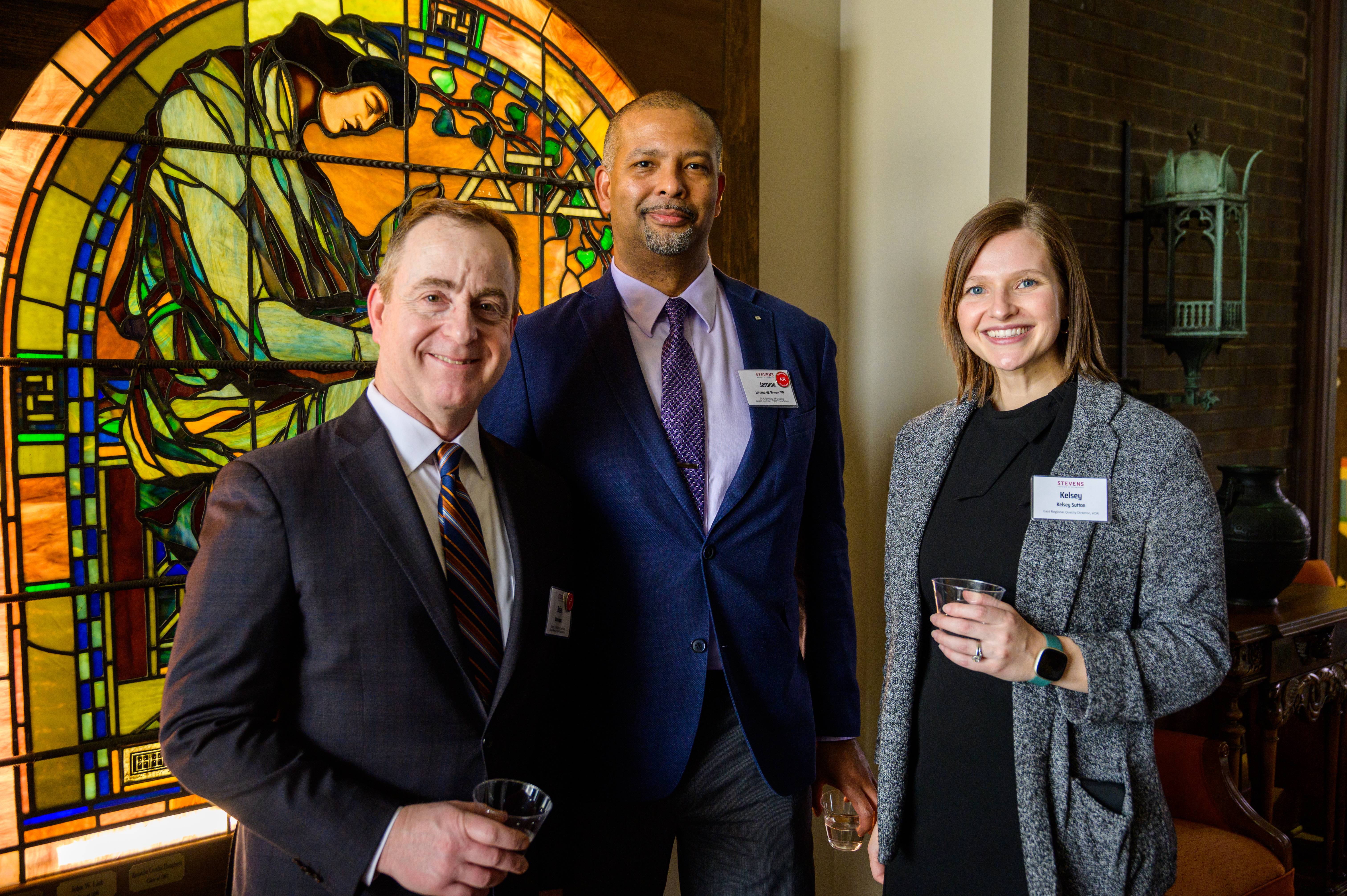 Jerome Brown '99 and two HDR colleagues Brian Hoppy pose in the library conference room during a visit to Stevens.