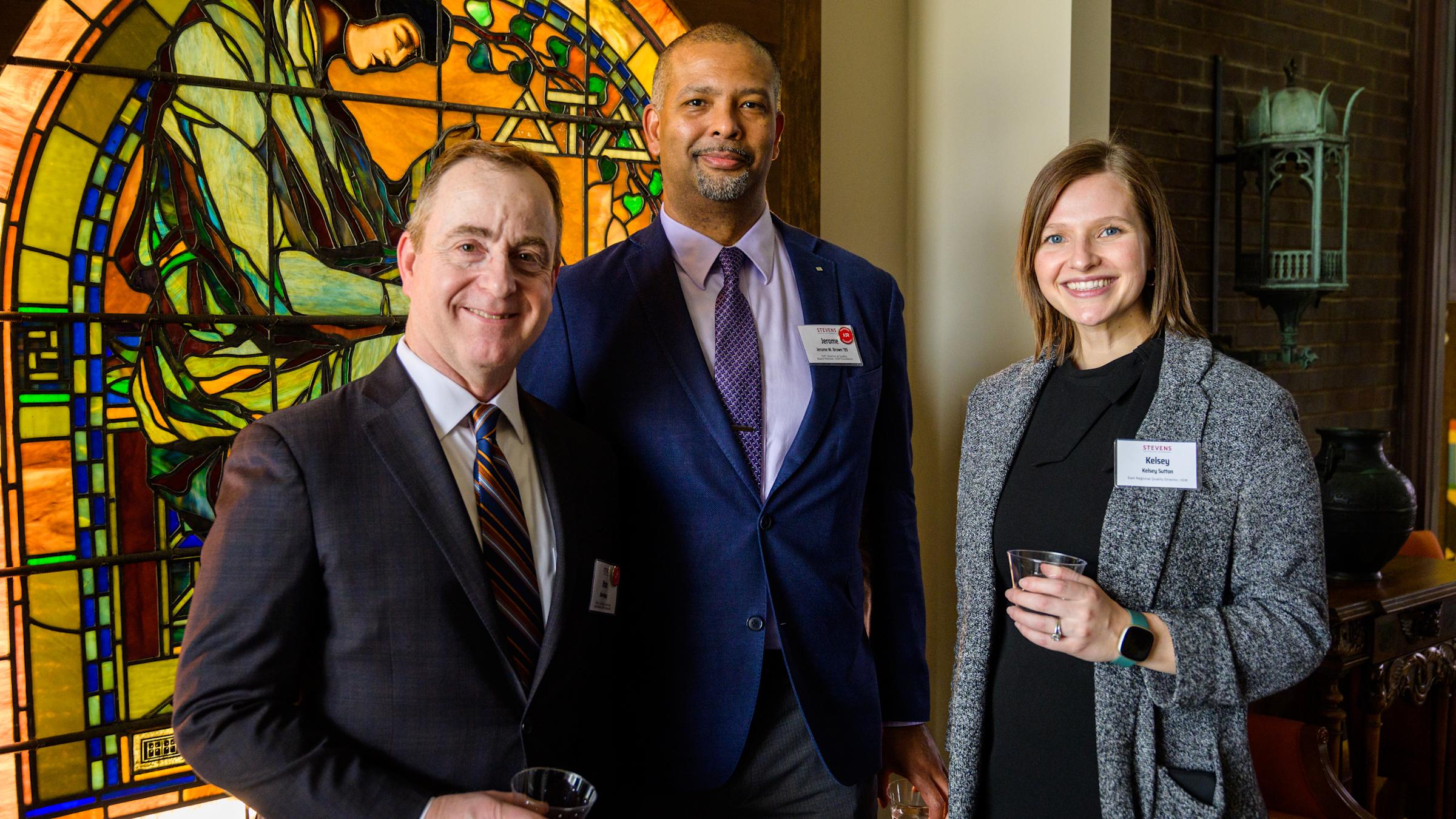Jerome Brown '99 and two HDR colleagues Brian Hoppy pose in the library conference room during a visit to Stevens.