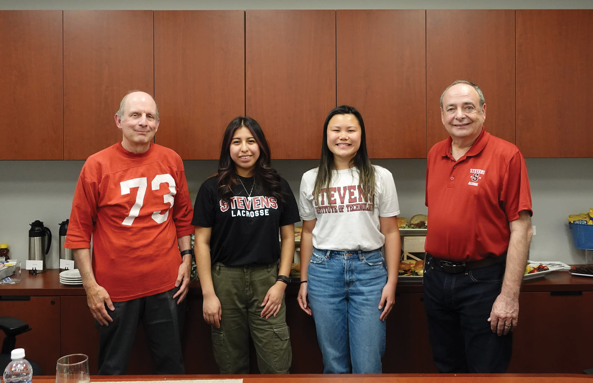 Bruce Blondina ’73 and Frank Vastano ’73 meet Class of 1973 Scholarship recipients, Erika Vargas and Emily Ng.