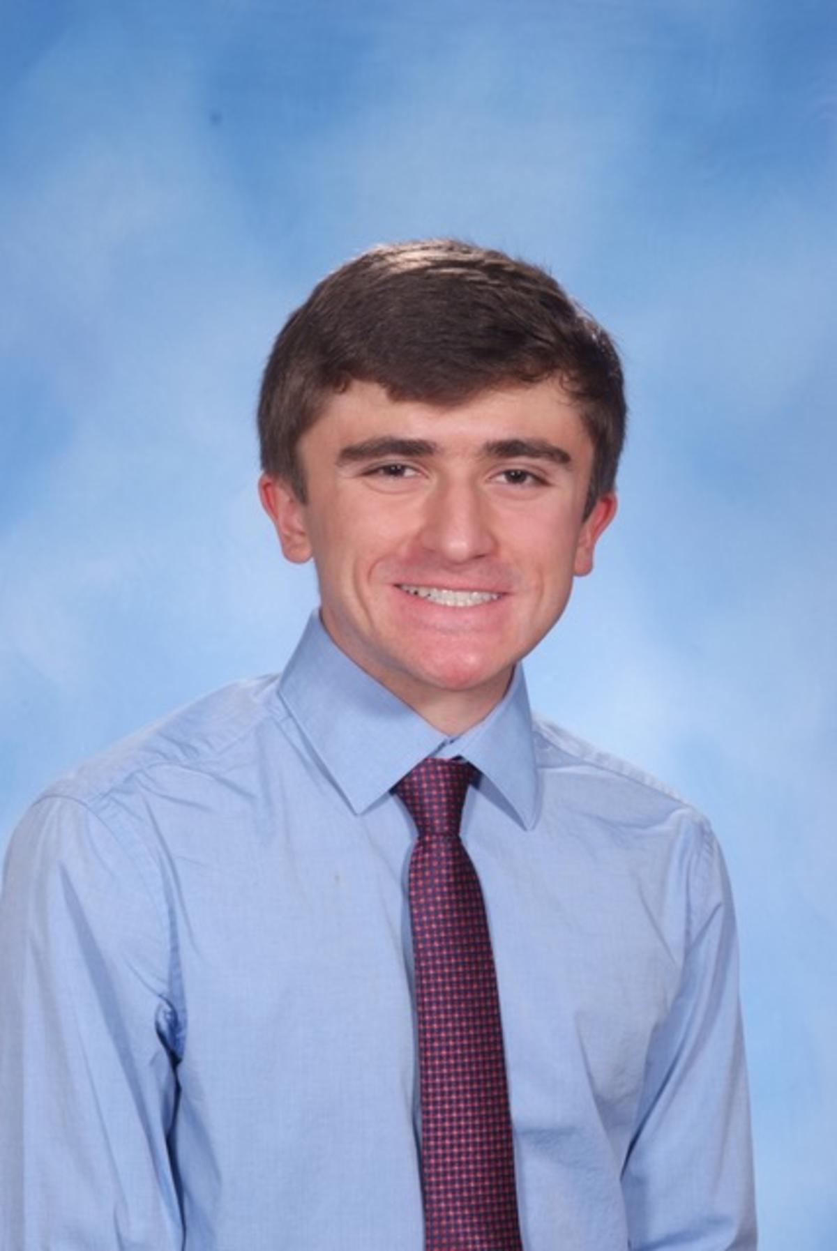 A headshot of a man