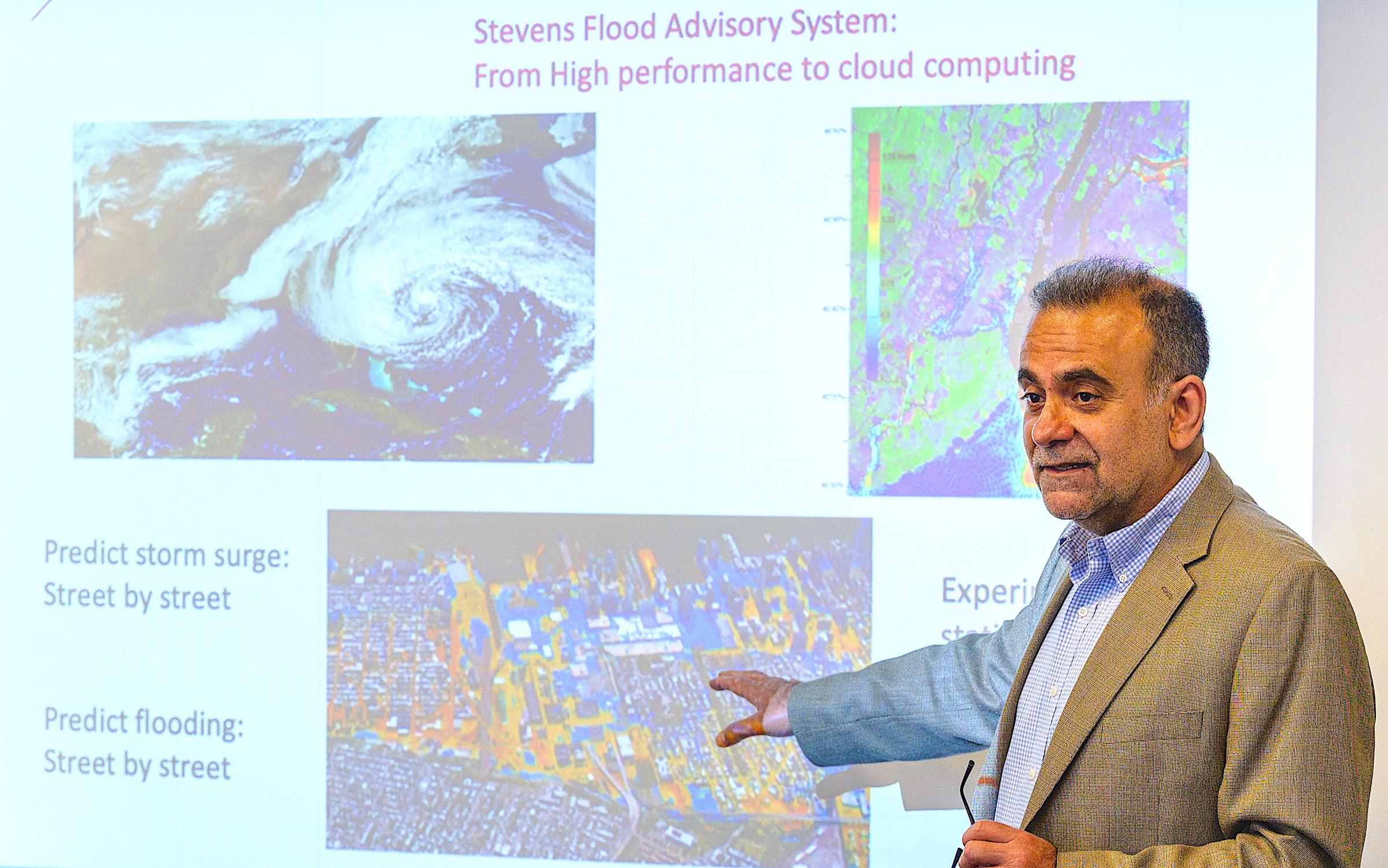 Stevens professor Muhammad Hajj explaining Stevens flood prediction systems