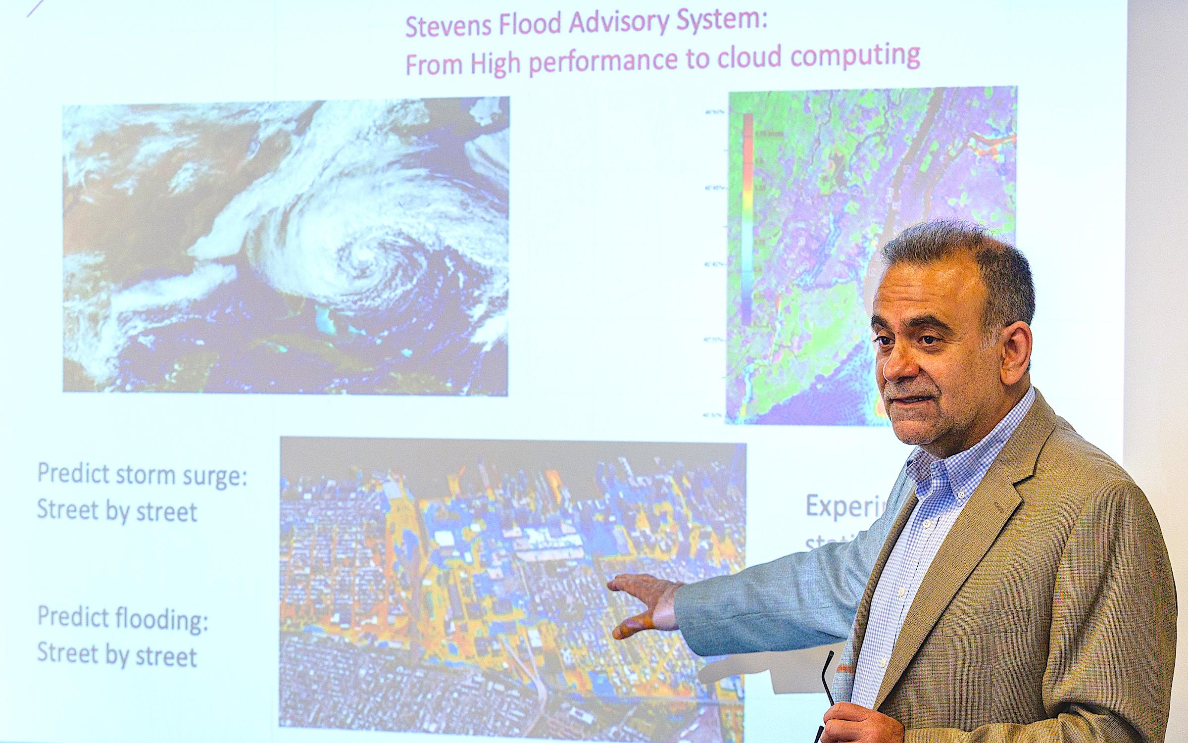 Stevens professor Muhammad Hajj explaining Stevens flood prediction systems