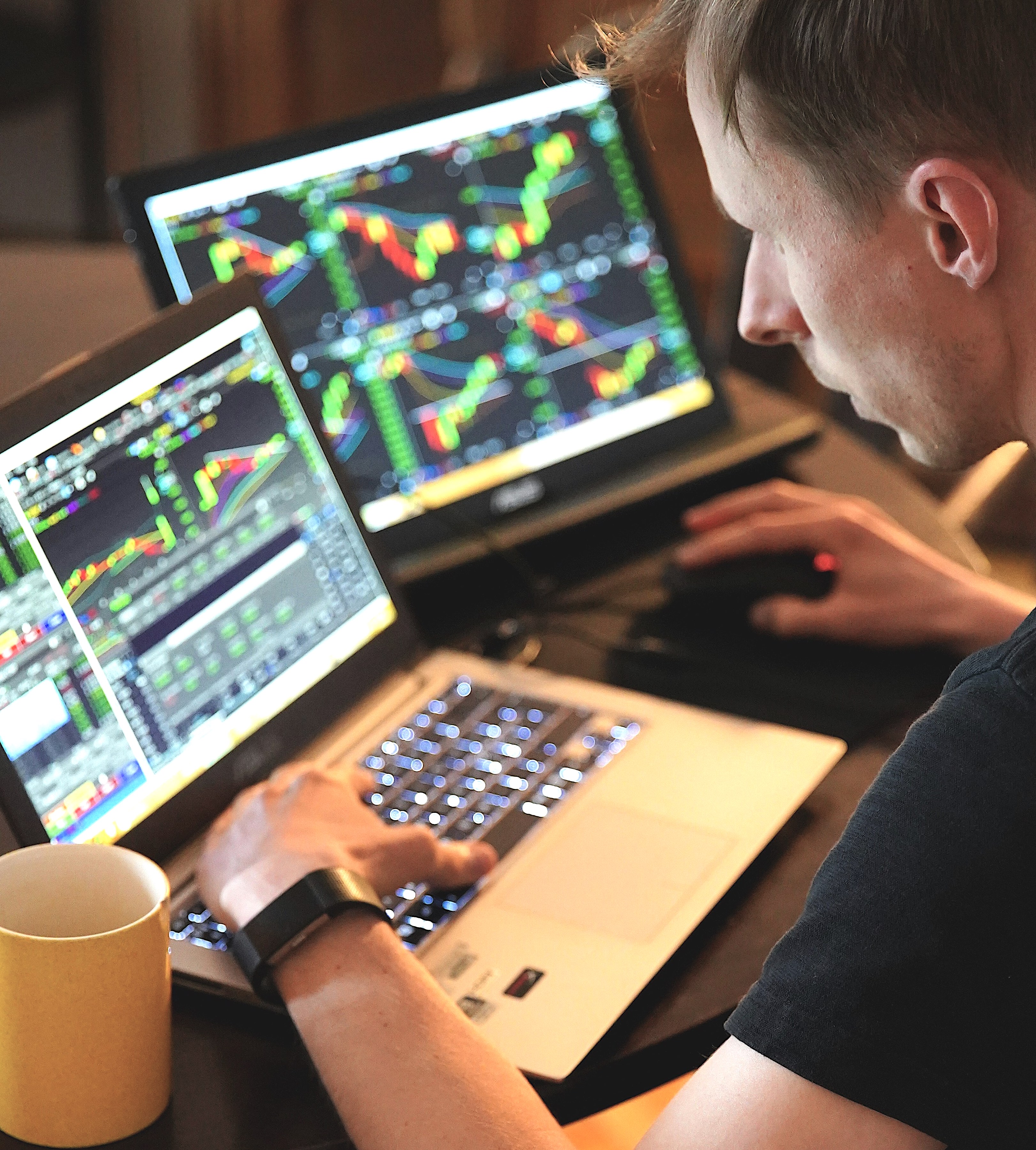 Trader using phone to check stock markets