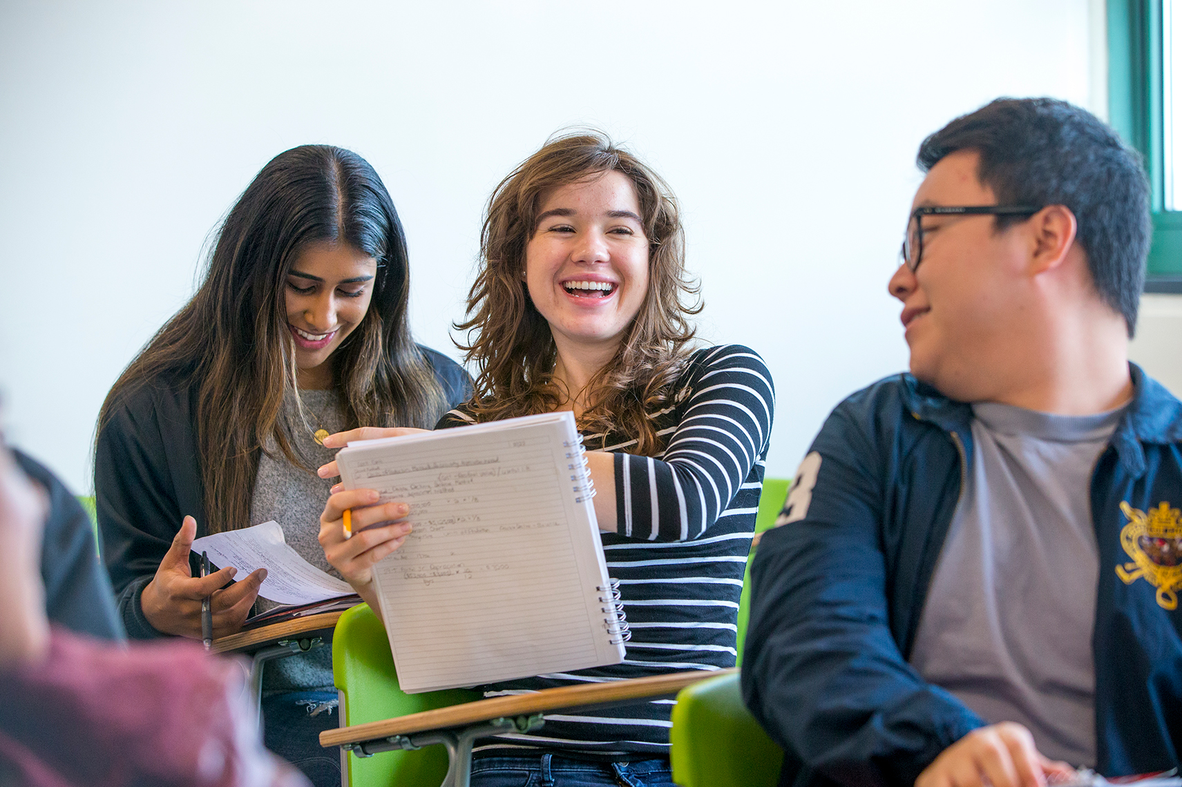 Students laughing in a classroom