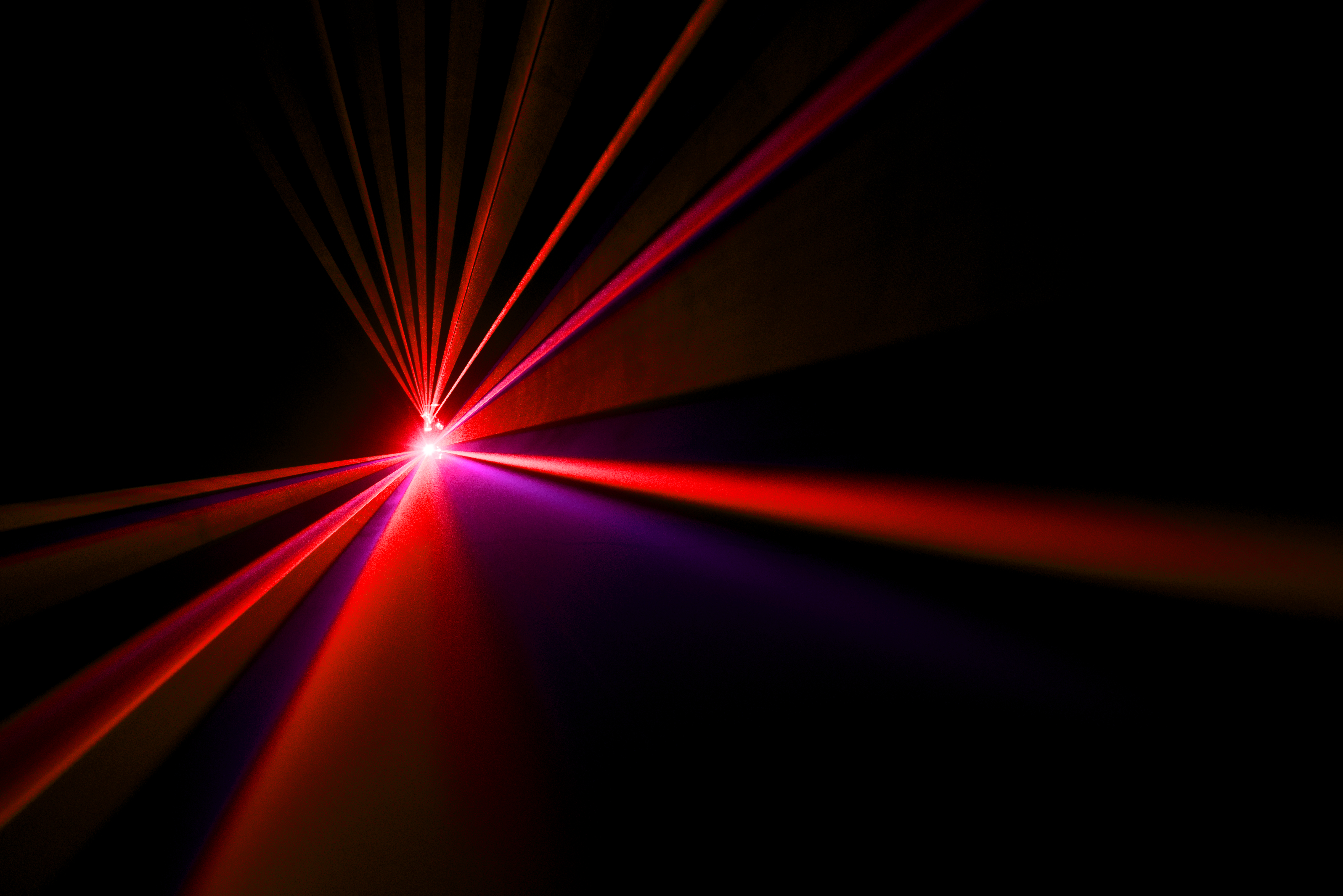 Red lasers starting at one center point and coming outward toward the viewer.