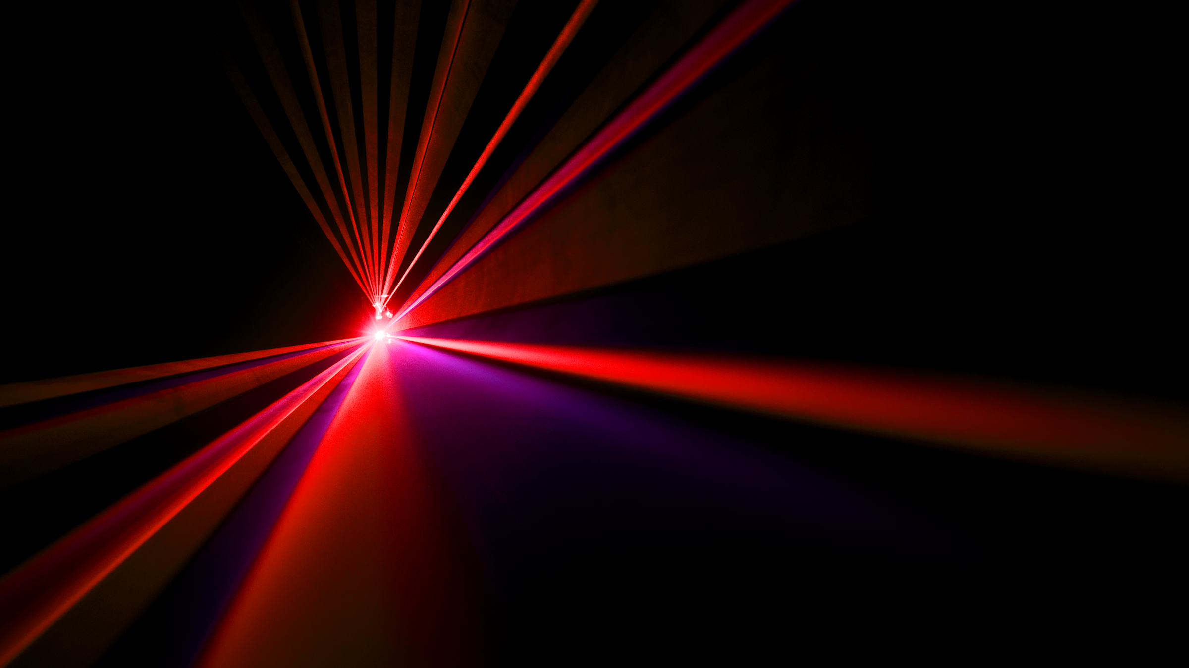 Red lasers starting at one center point and coming outward toward the viewer.