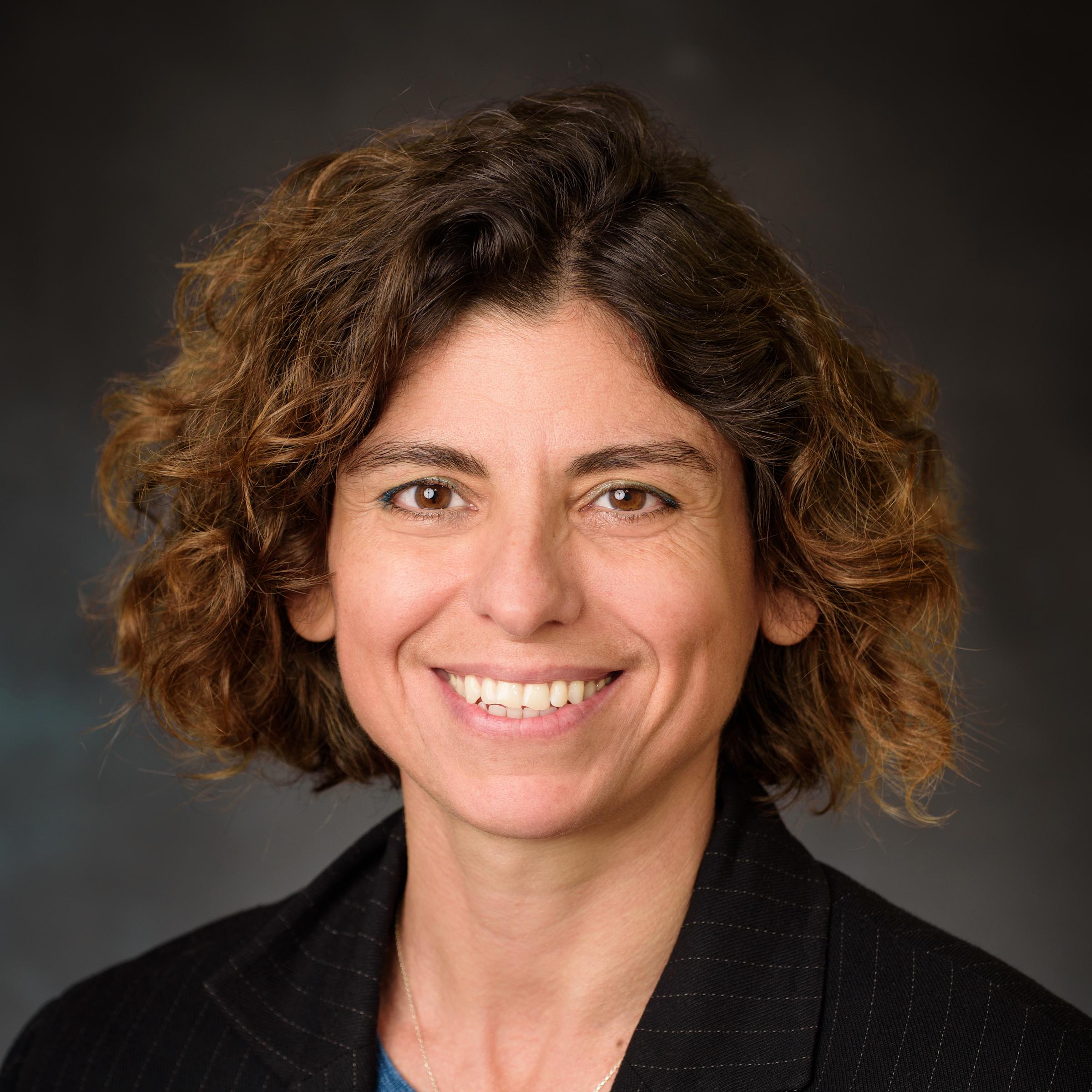 Professional portrait photo of Pinar Akcora