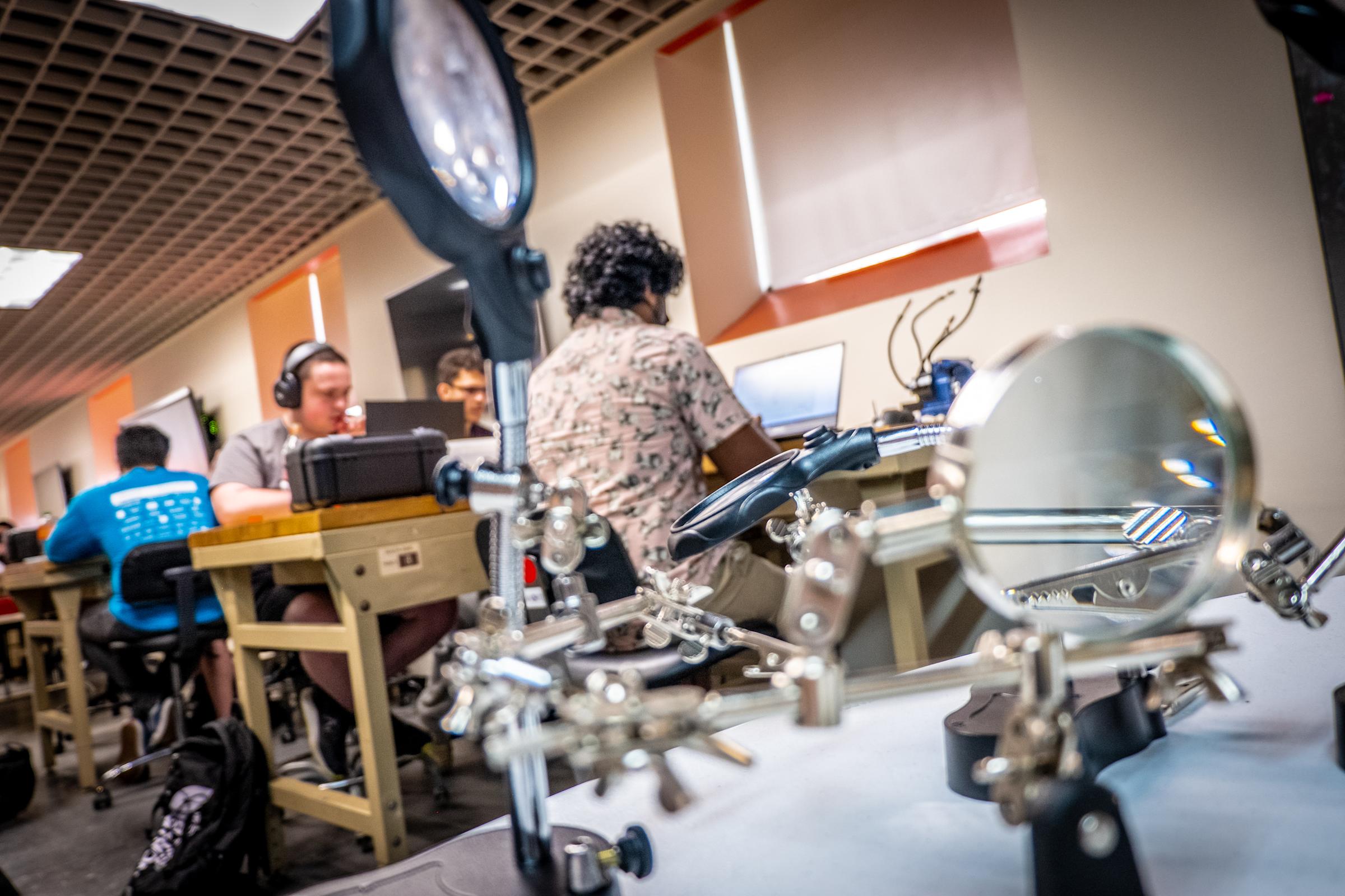 Students working in a lab setting.