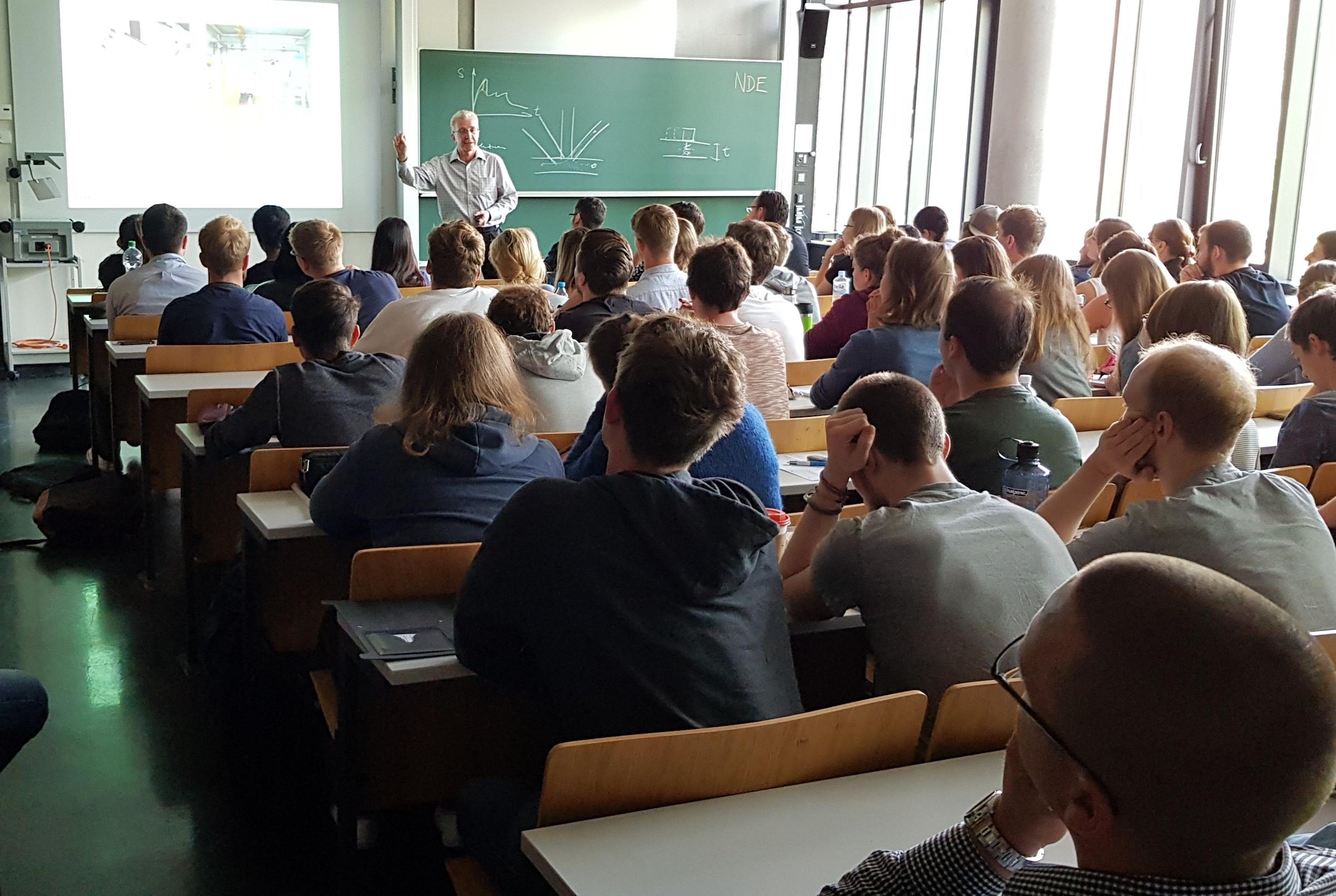 Dimitri teaching CEOE students in a classroom