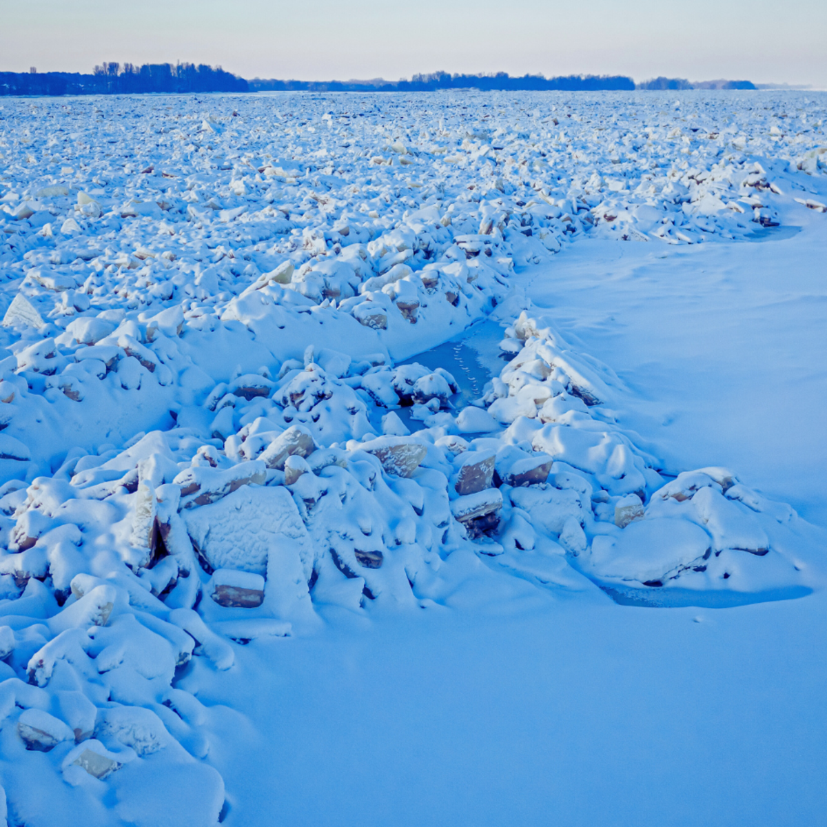 Ice jam on Vistula River in Poland. Water transport on the river. Aerial view of wildlife in Poland.