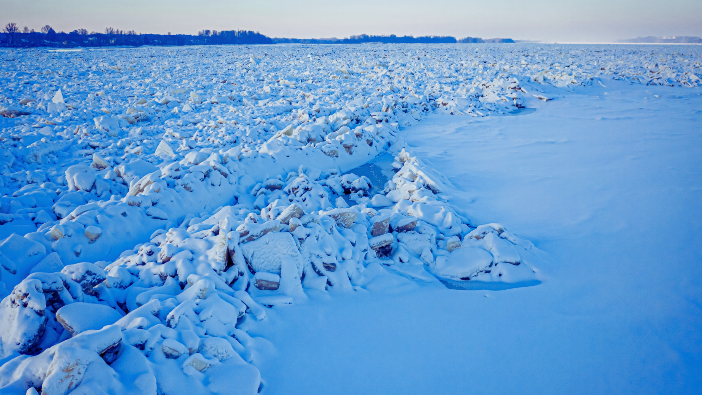 Ice jam on Vistula River in Poland. Water transport on the river. Aerial view of wildlife in Poland.
