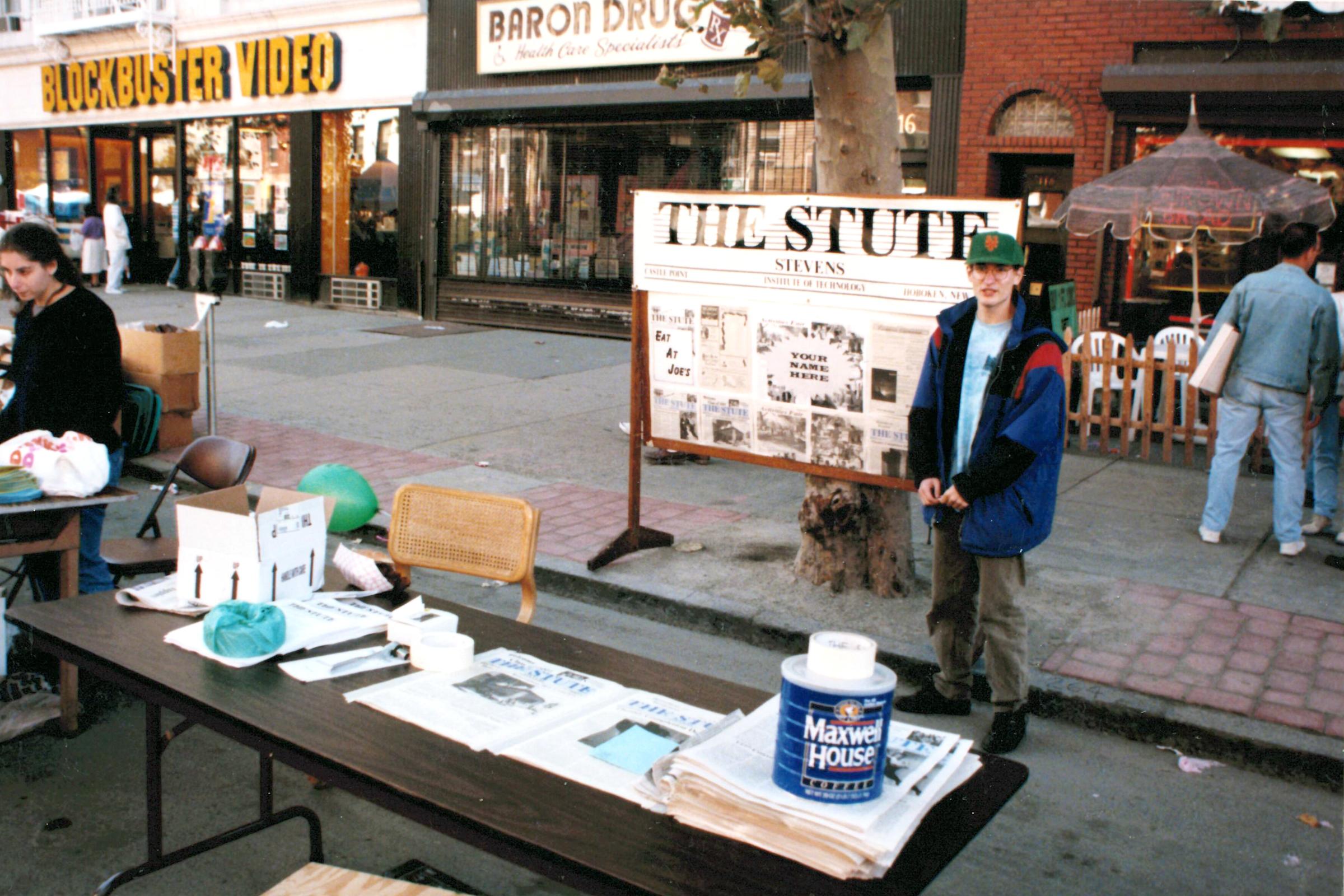 A man stands on Washington street representing the Stute during an event.