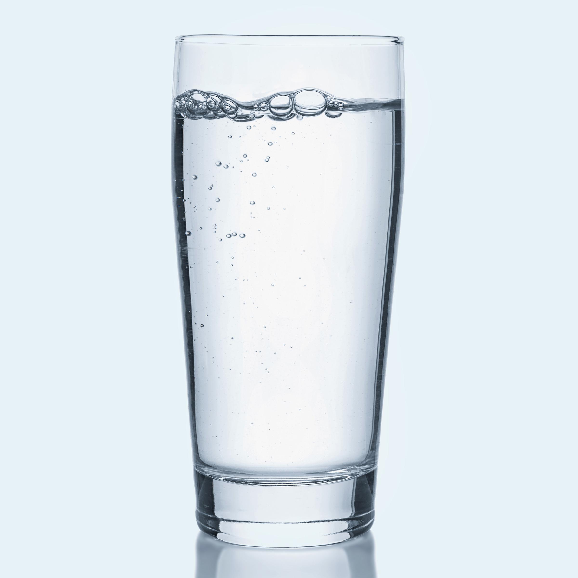 A glass of water.