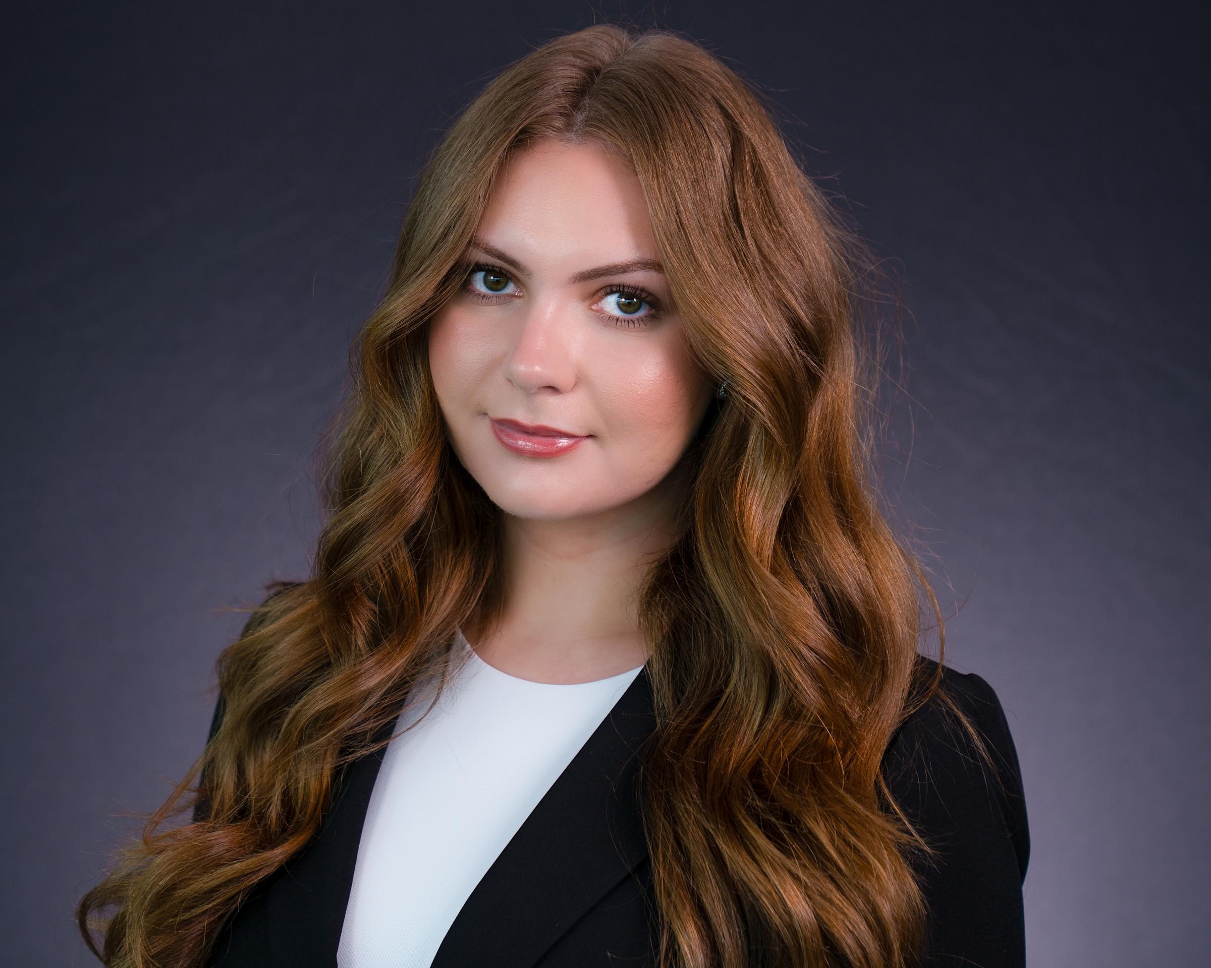 Headshot of Rochelle Okhtenberg wearing professional attire.