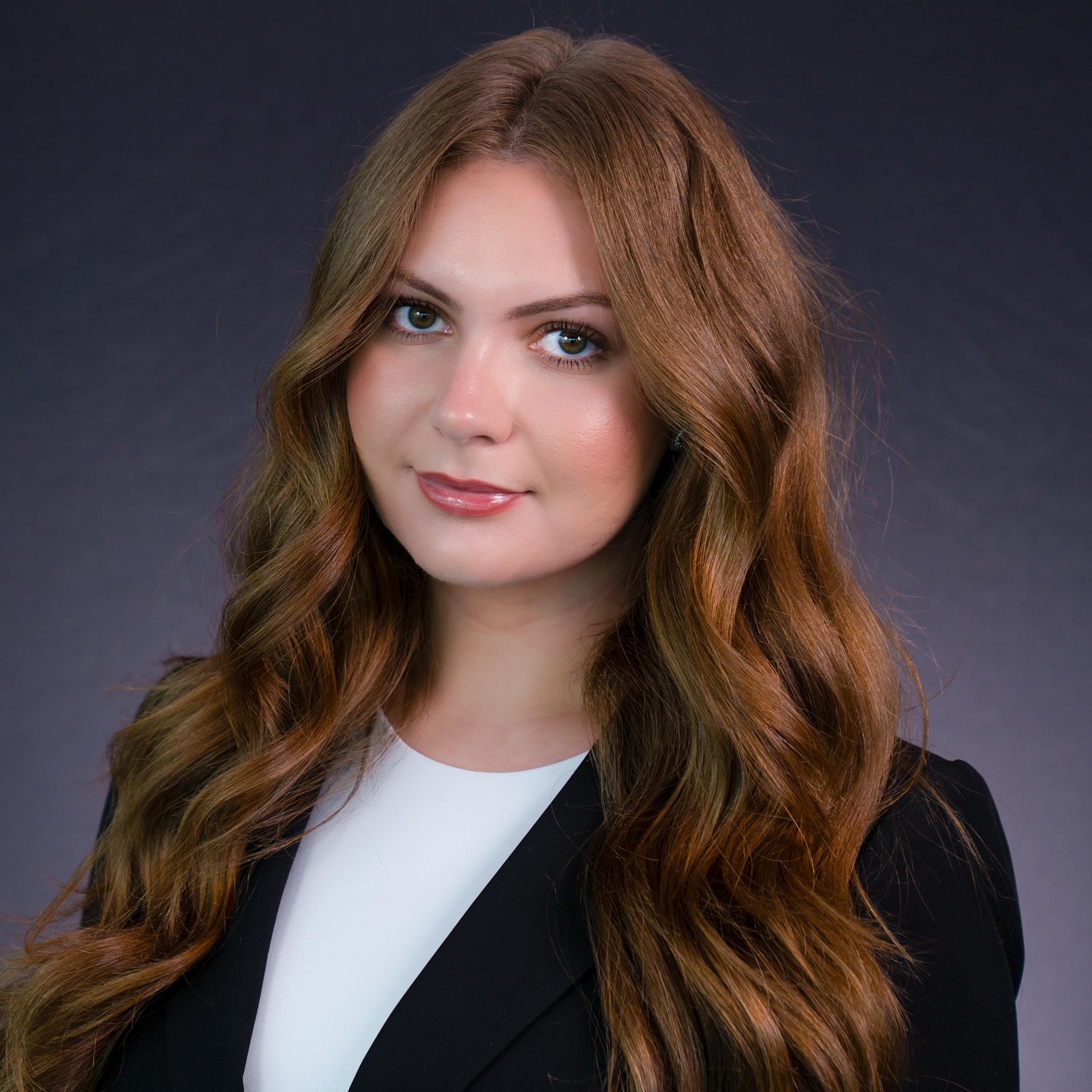 Headshot of Rochelle Okhtenberg wearing professional attire.