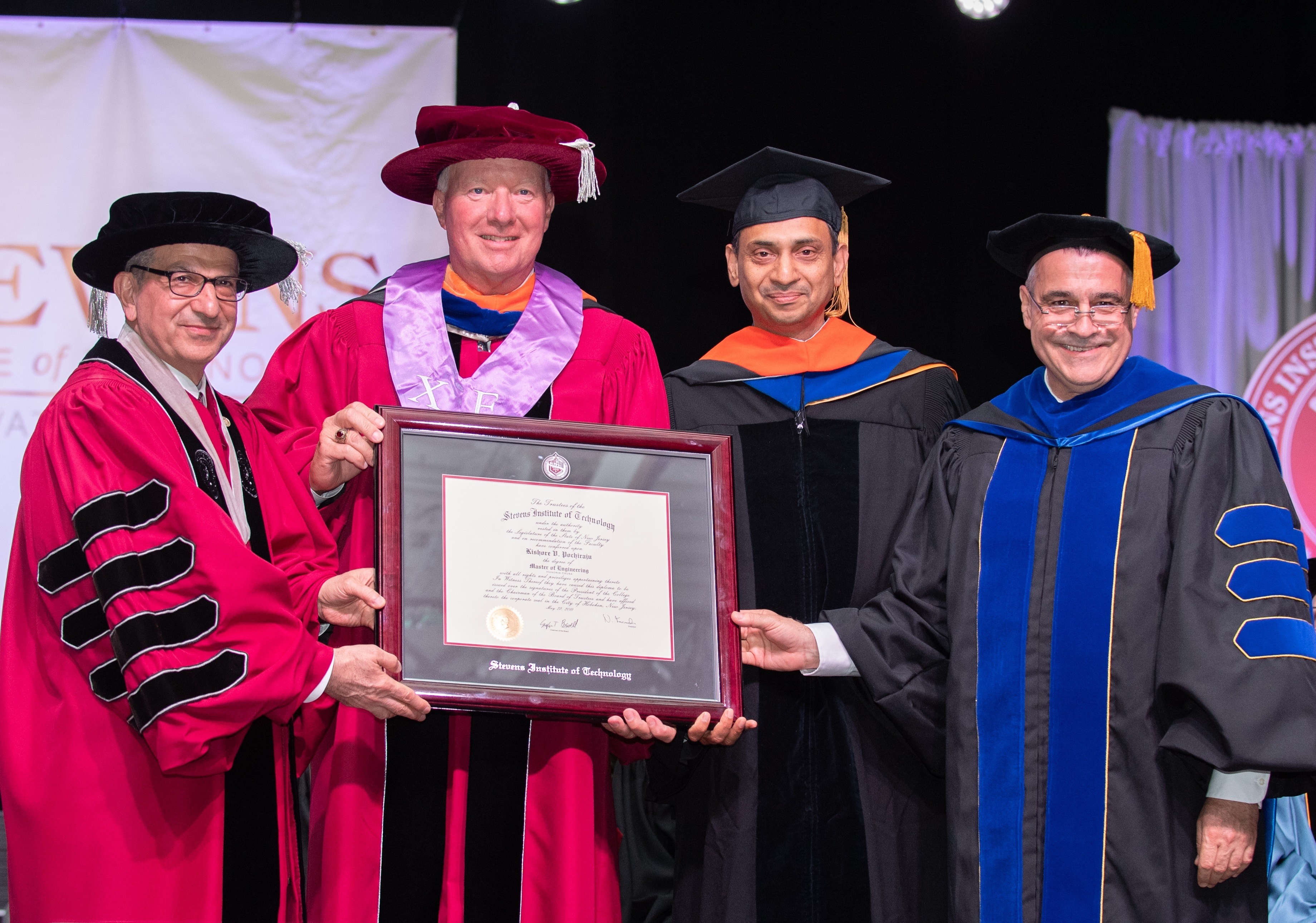 President Nariman Farvardin, Trustees Chairman Stephen T. Boswell, Dr. Kishore Pochiraju and Provost Christophe Pierre at Graduate Commencement