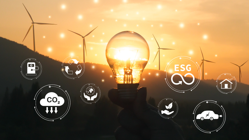 Renewable energy, clean technology concept. Light Bulb and ecosystem icons on wind turbine and nature background.