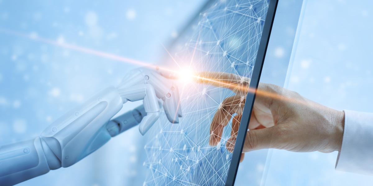 Graphic showing robot and human hand meeting on a computer screen.