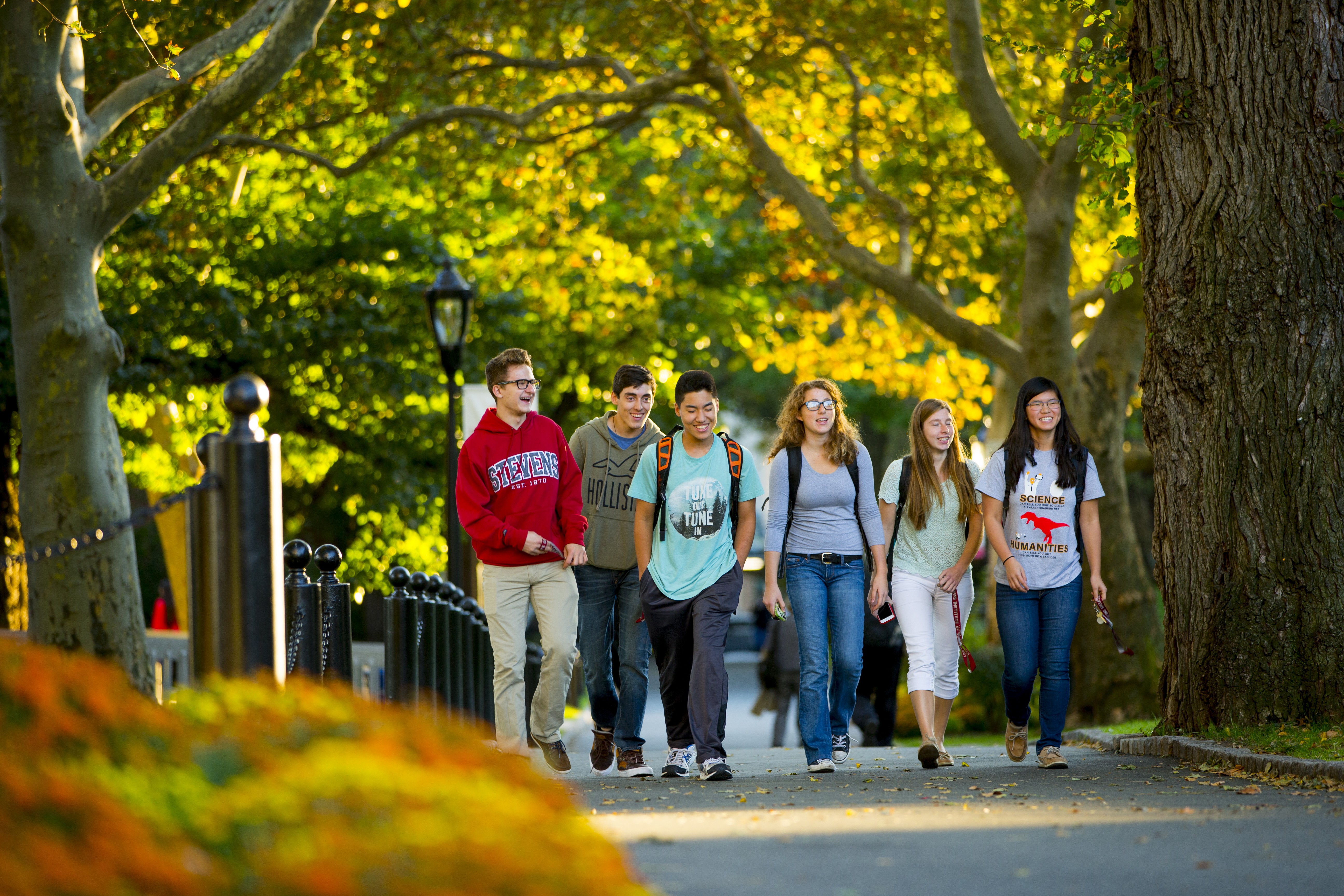 Students walking on campus in Fall