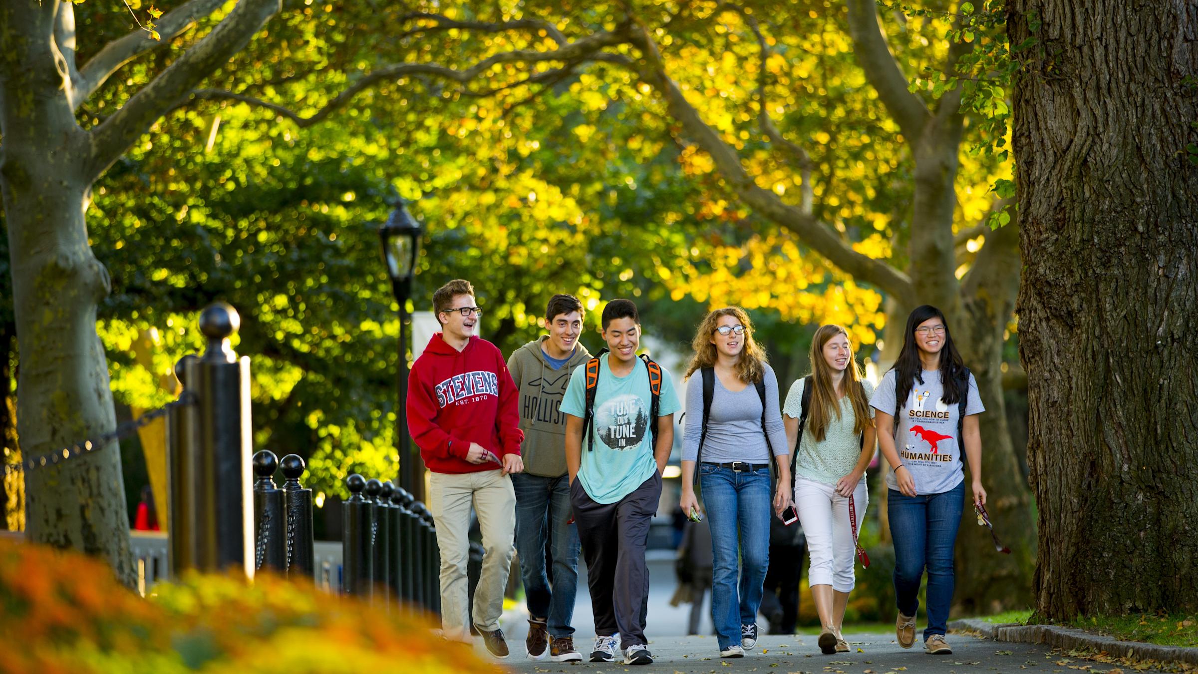 a female student wearing VR goggles in the virtual reality lab