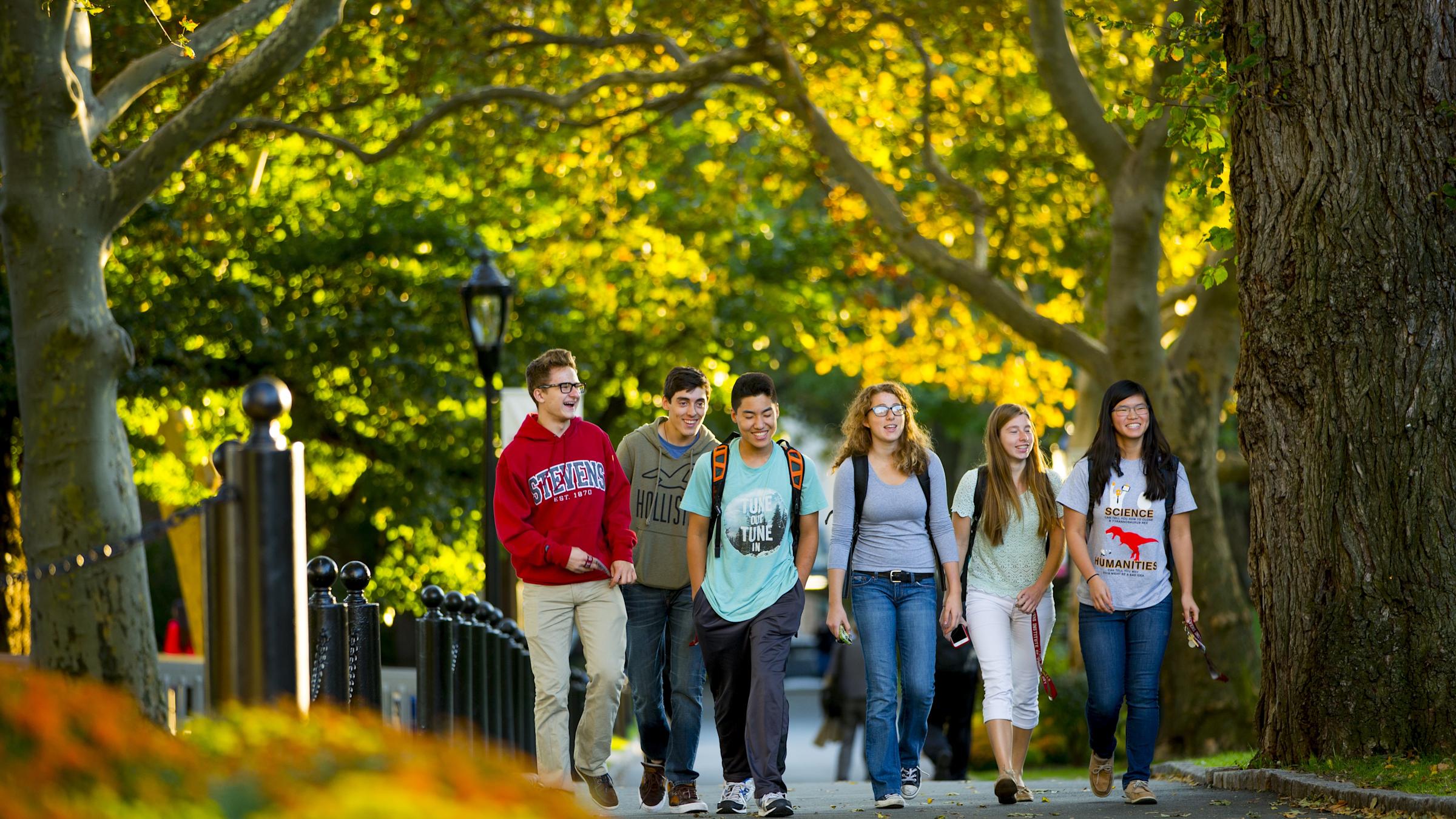 Students walking on campus in Fall