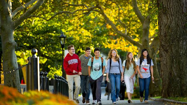 Students walking on campus in Fall