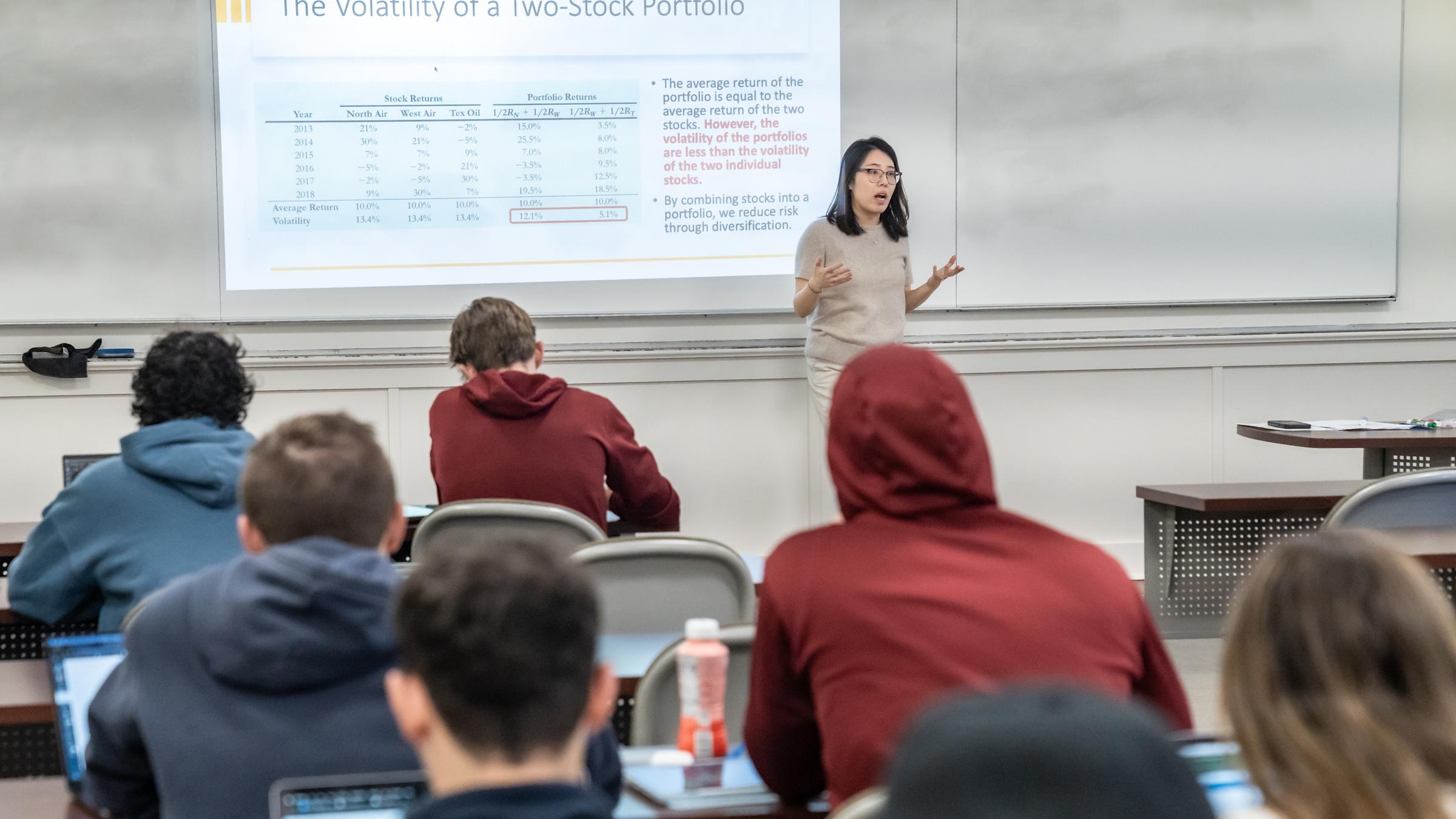 Emma Wang teaching in a classroom
