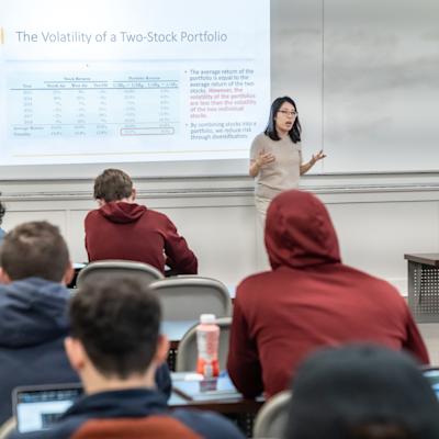 Emma Wang teaching in a classroom