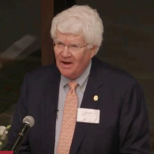 Frank Semcer, Sr. '65 speaking at a podium