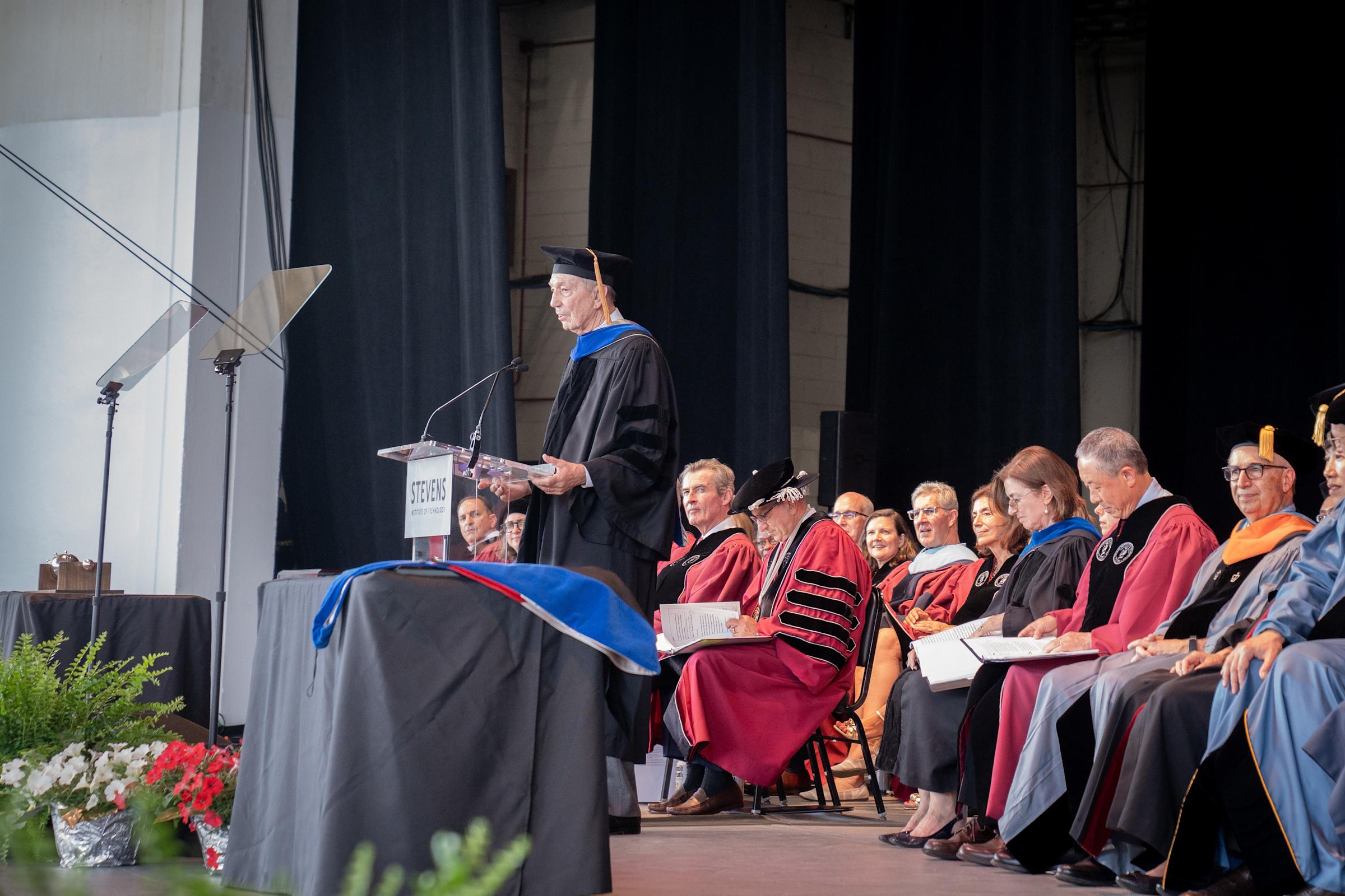 Speaker Michael Kakos provides remarks during graduate ceremony