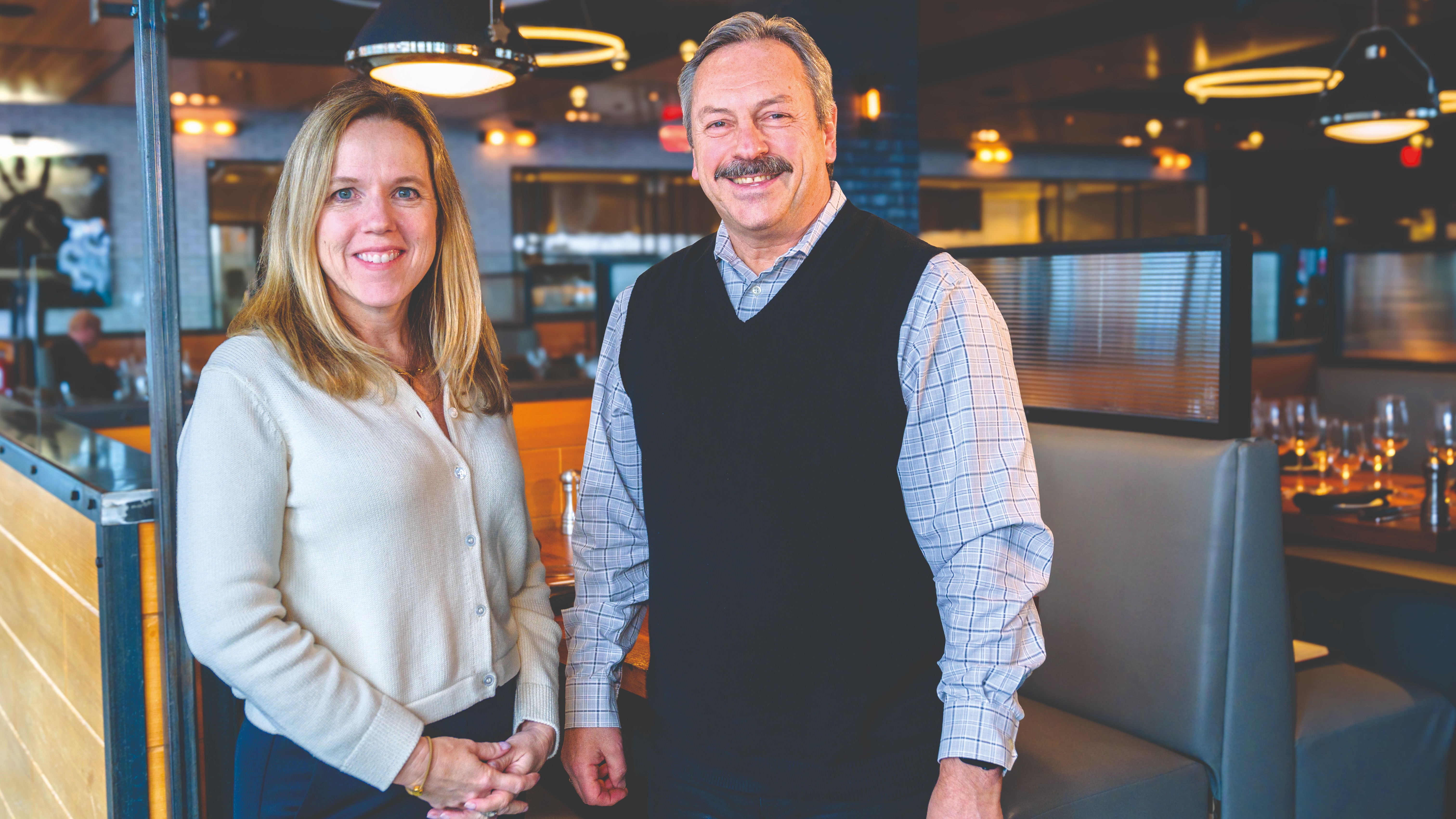 Associate Professor Ann Mooney Murphy and Jim Marsh, a 2007 Stevens masters graduate, pose for a portrait after meeting one another at a restaurant. 