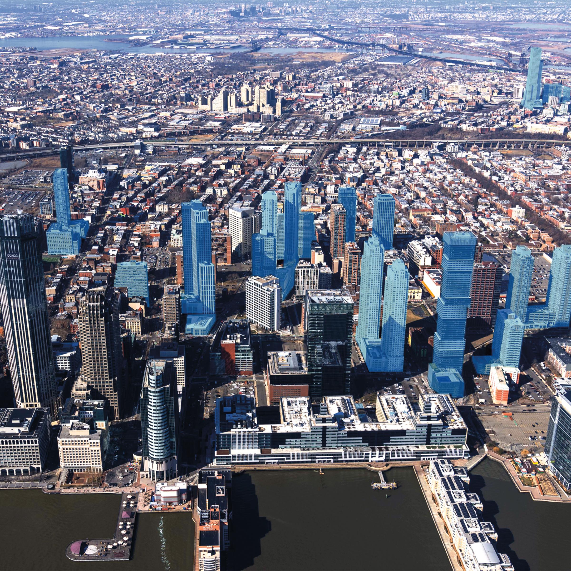 A bird’s eye view of the Jersey City Skyline on a clear day. Toward the middle of the photo, more than a dozen of the city’s buildings are shaded in light blue to denote the properties that alumni Anthony Diaco’s company has built.