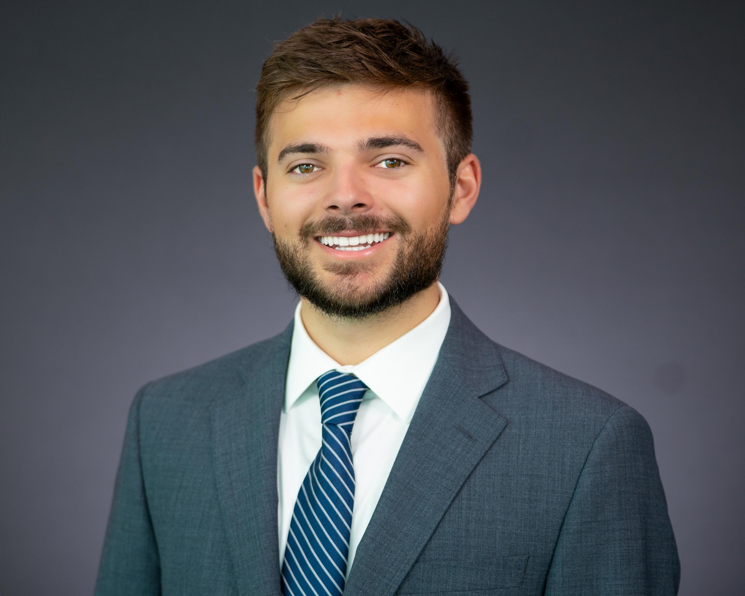 Headshot of Samuel Vacca wearing professional attire