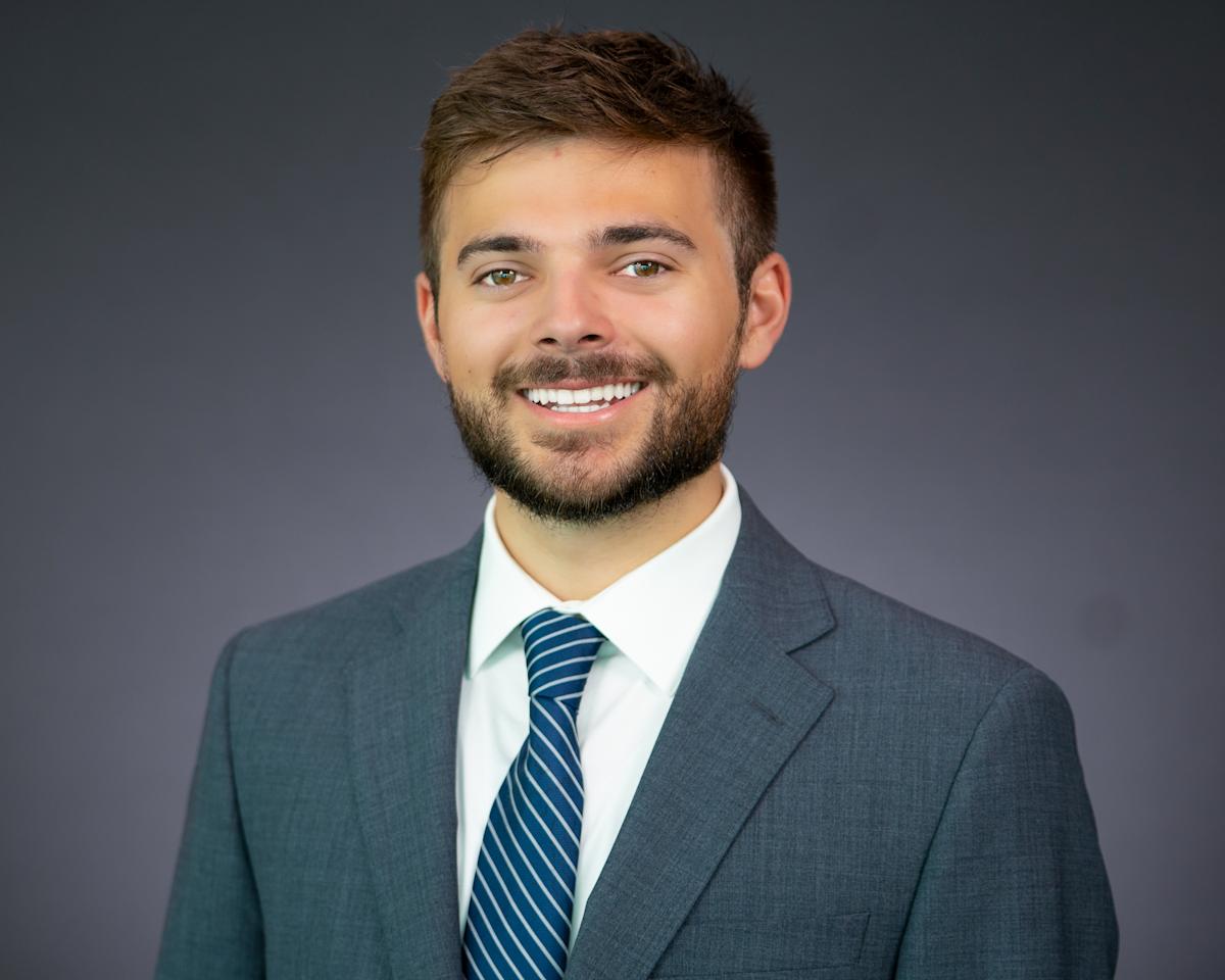 Headshot of Samuel Vacca wearing professional attire