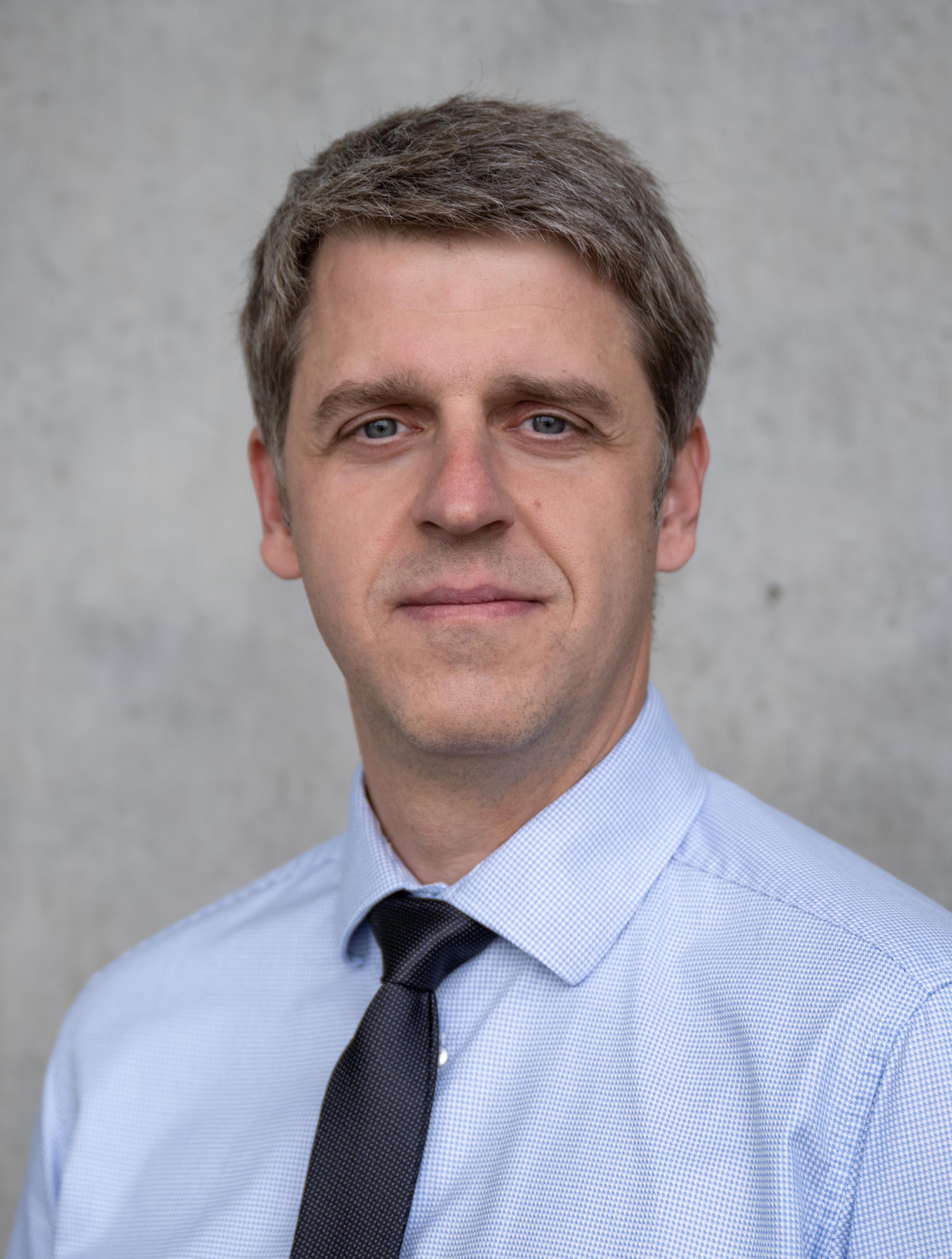 Headshot of Grzegorz Hałaj 