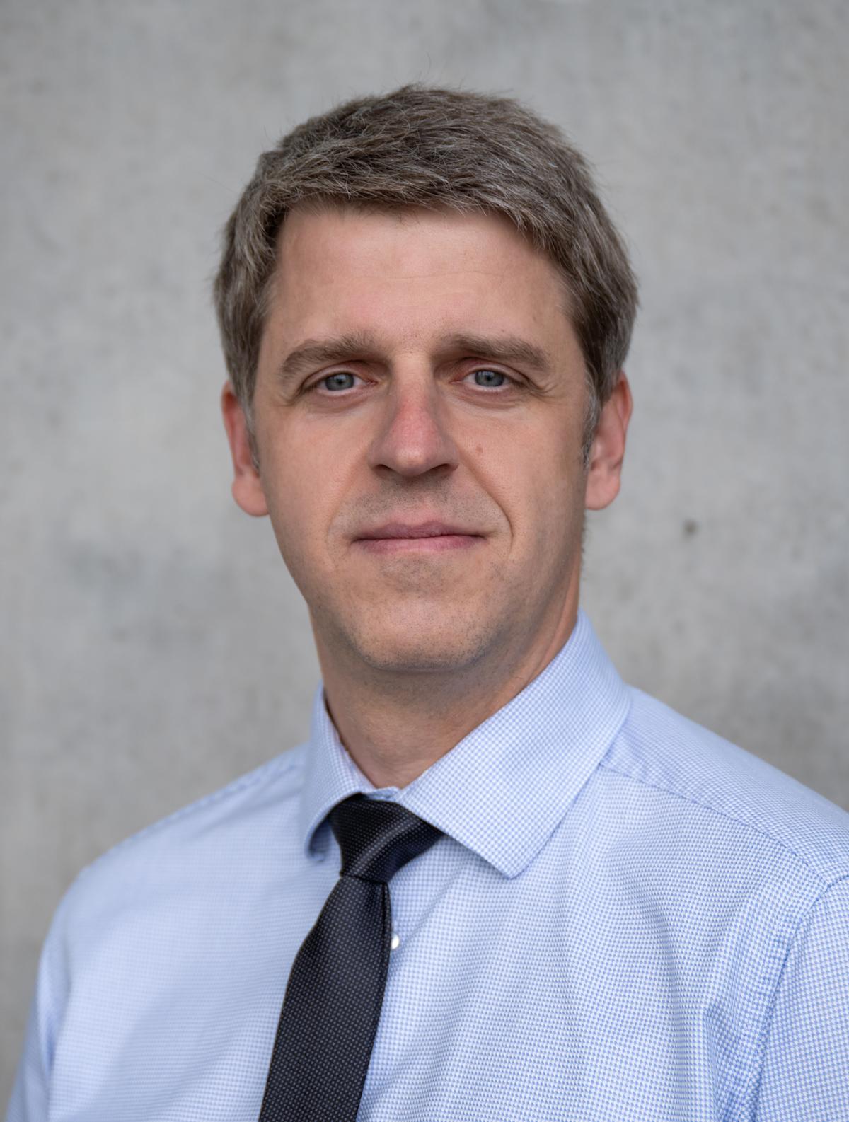 Headshot of Grzegorz Hałaj