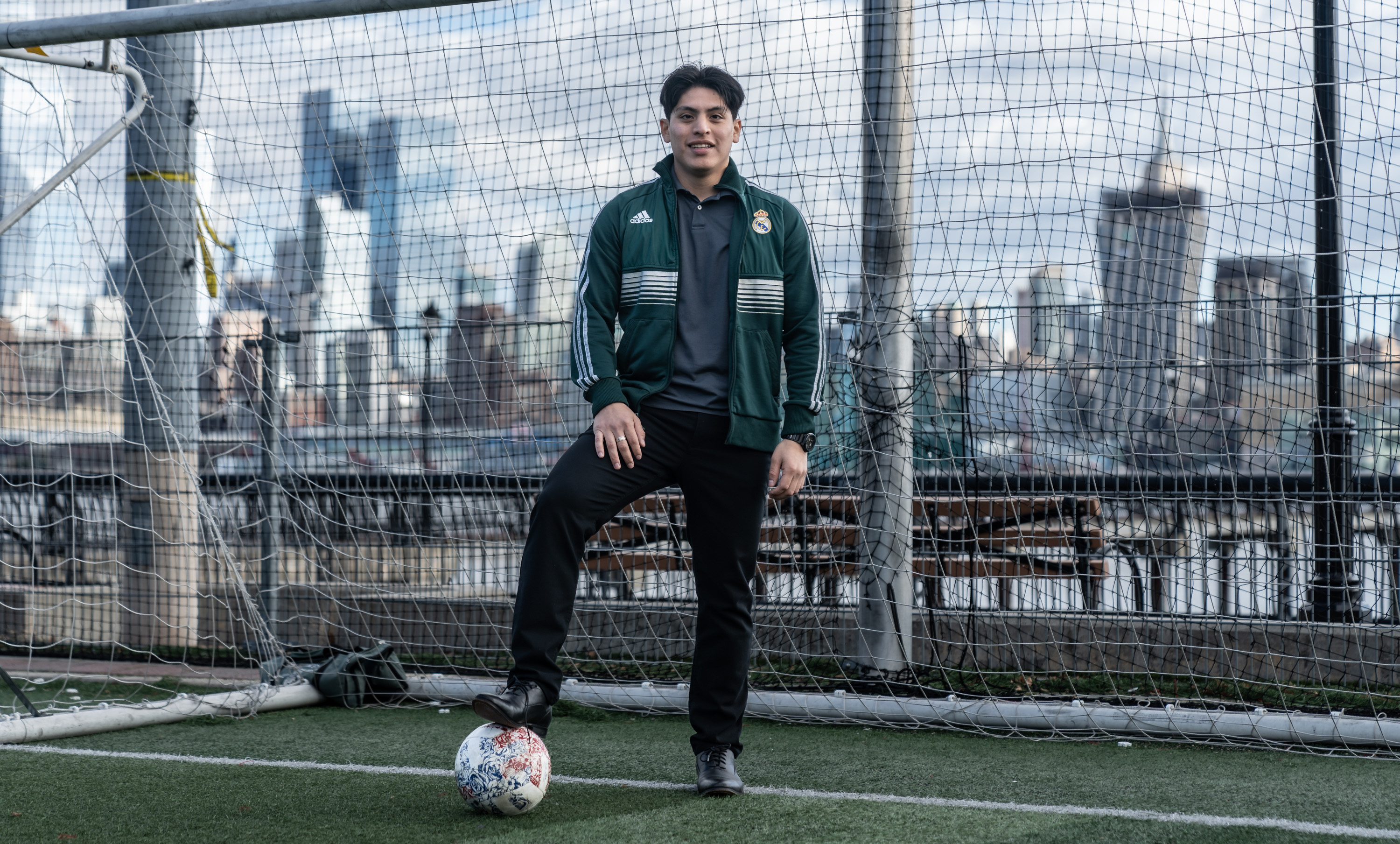 Bryan Campos with NYC skyline