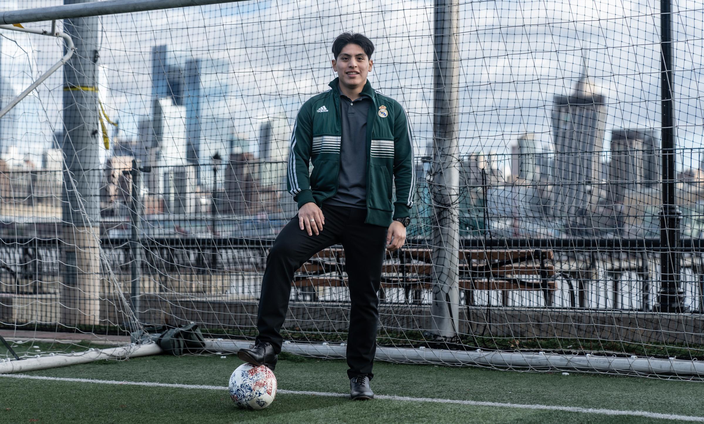 Bryan Campos with NYC skyline