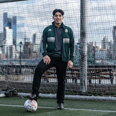 Bryan Campos with NYC skyline