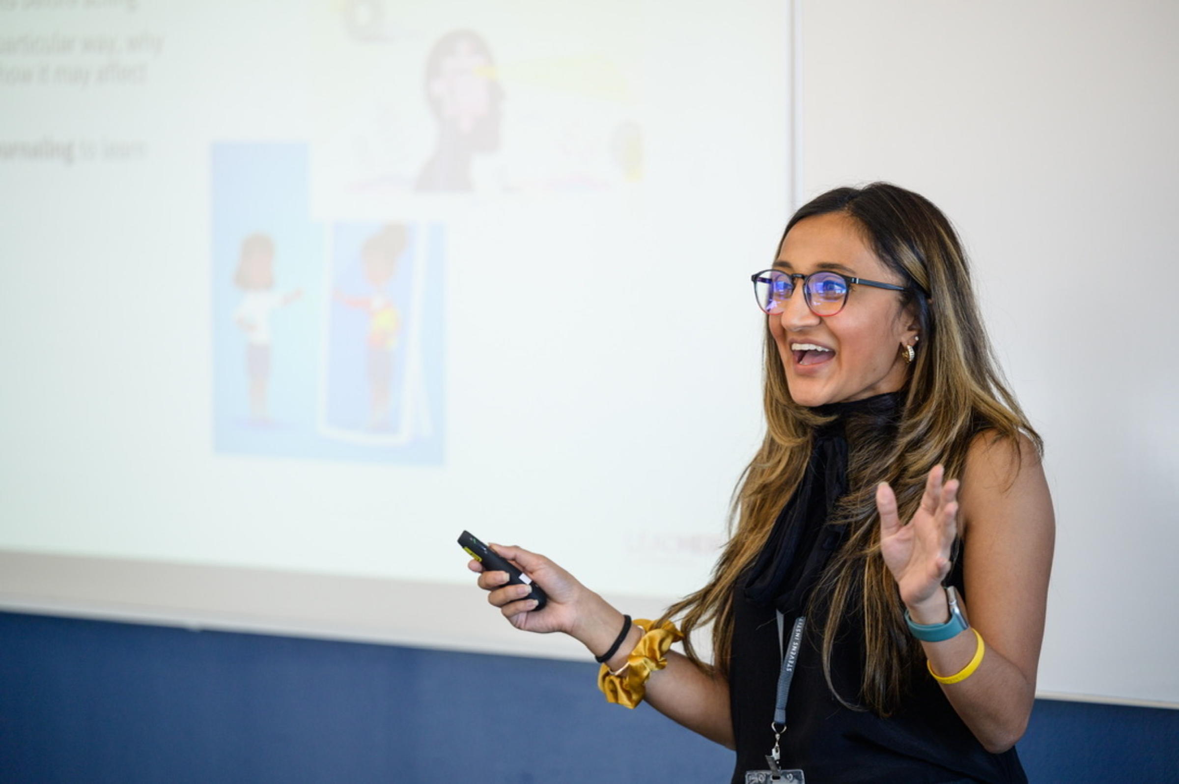 Serena Shah ’21 gives a presentation in front of a whiteboard