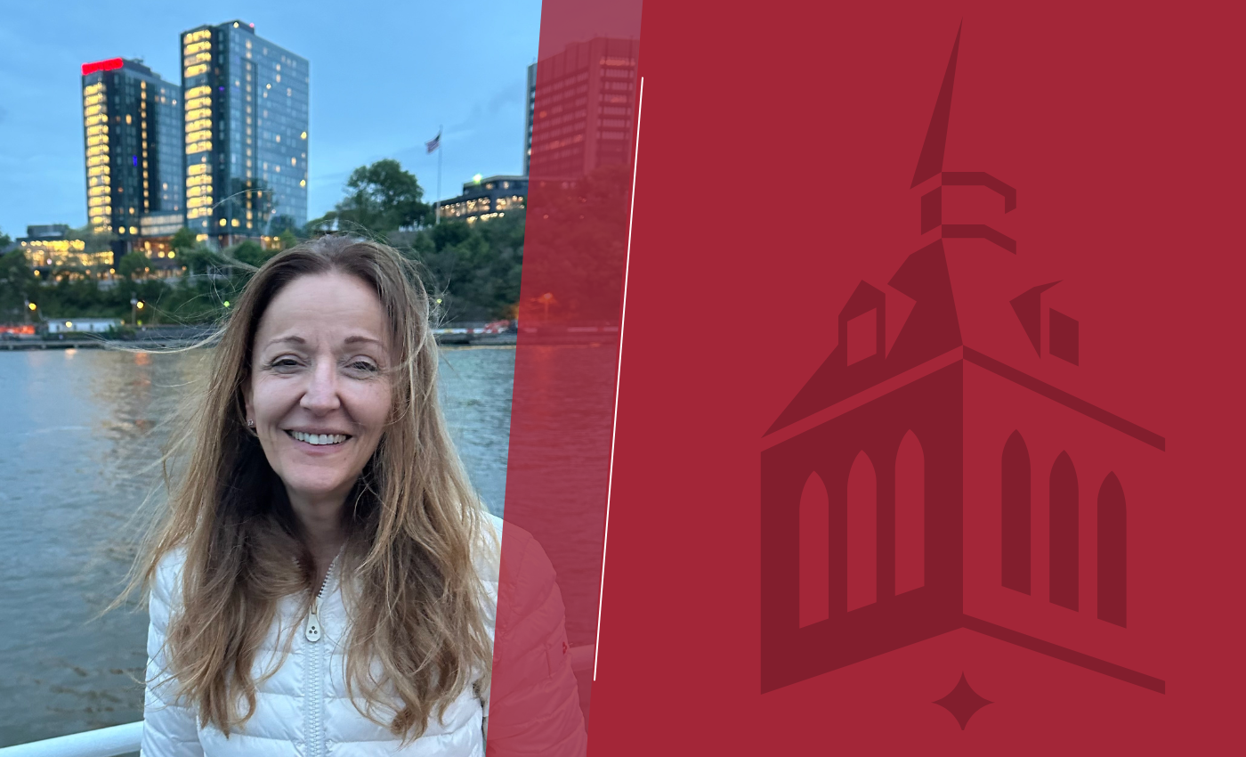 A photo of Paola DiMarzio in front of the Stevens skyline.
