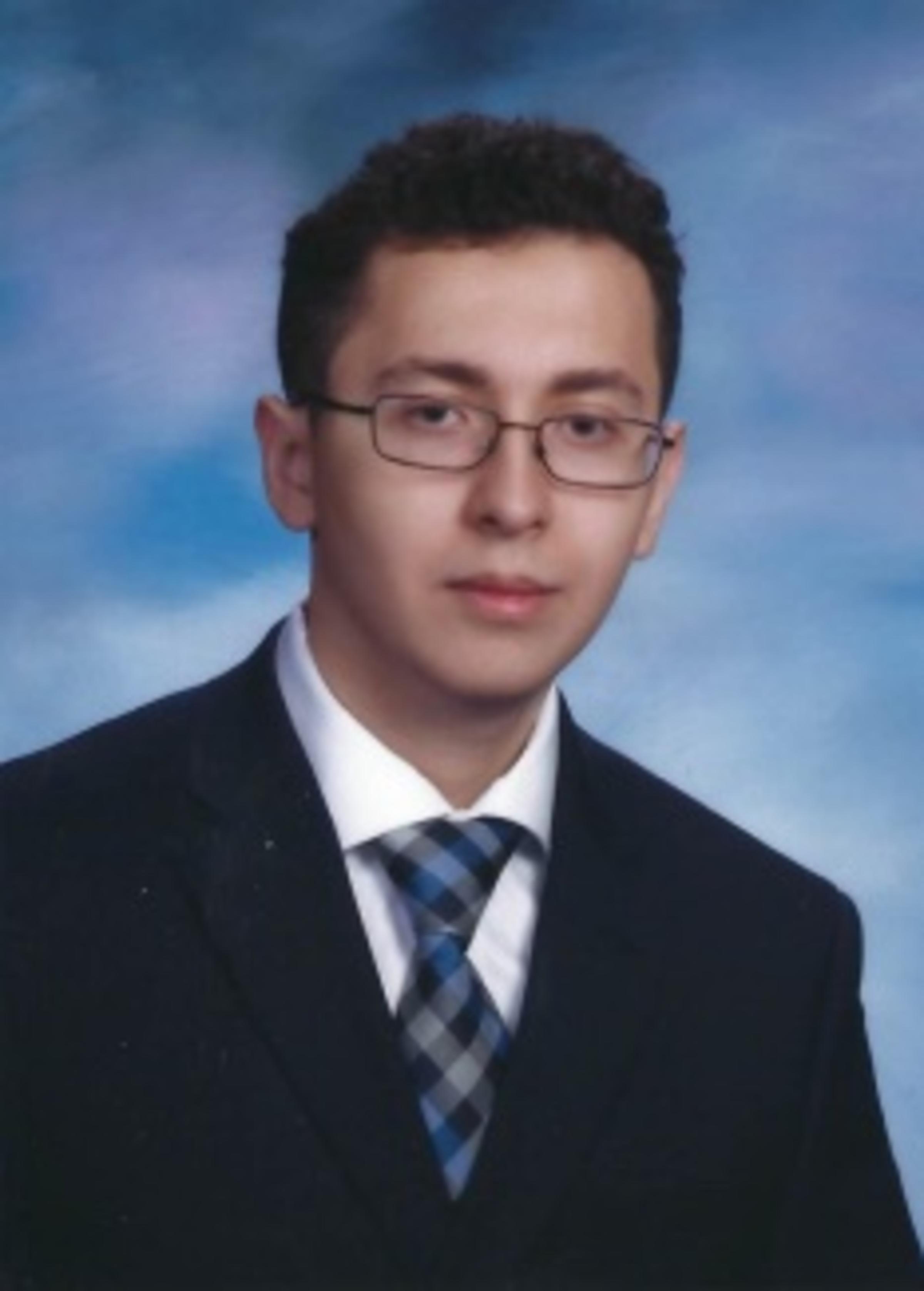 Headshot of Murad Arslaner